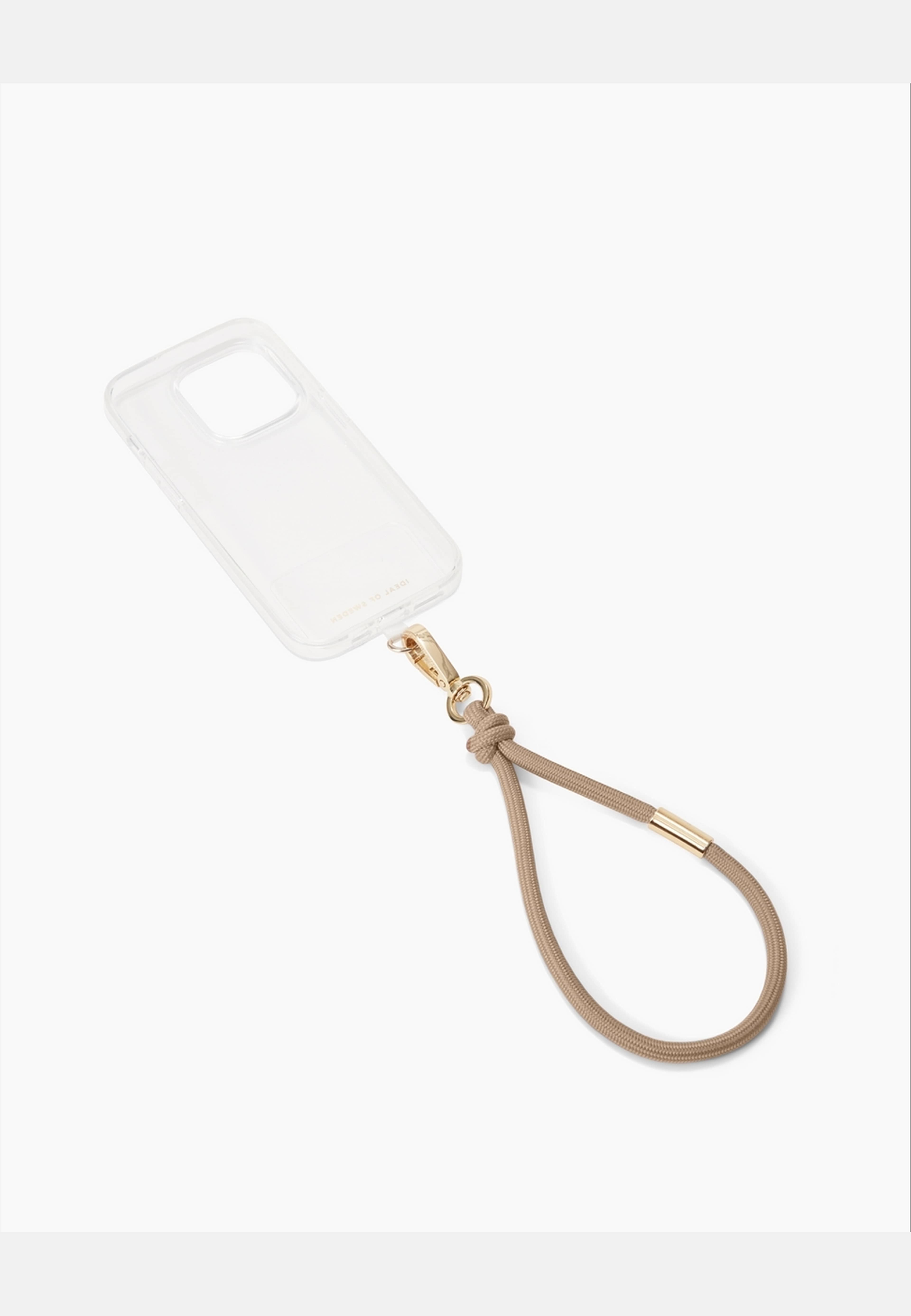 Cord Phone Wristlet, från Ideal Of Sweden, i färgen beige. Klicka för att öppna bilden i stort format