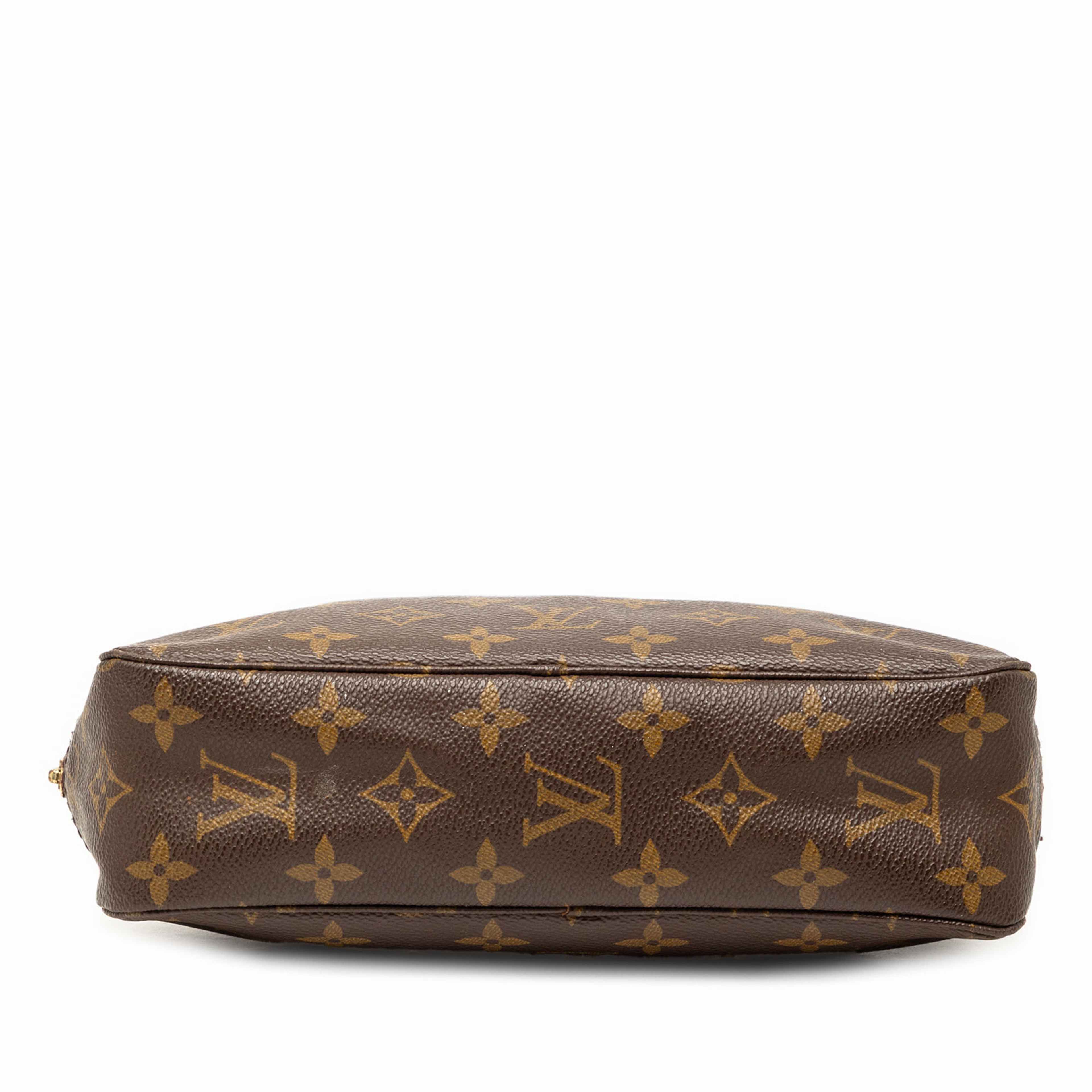 Louis Vuitton Monogram Trousse Toilette 23, från Luxclusif, i färgen brun. Klicka för att öppna bilden i stort format