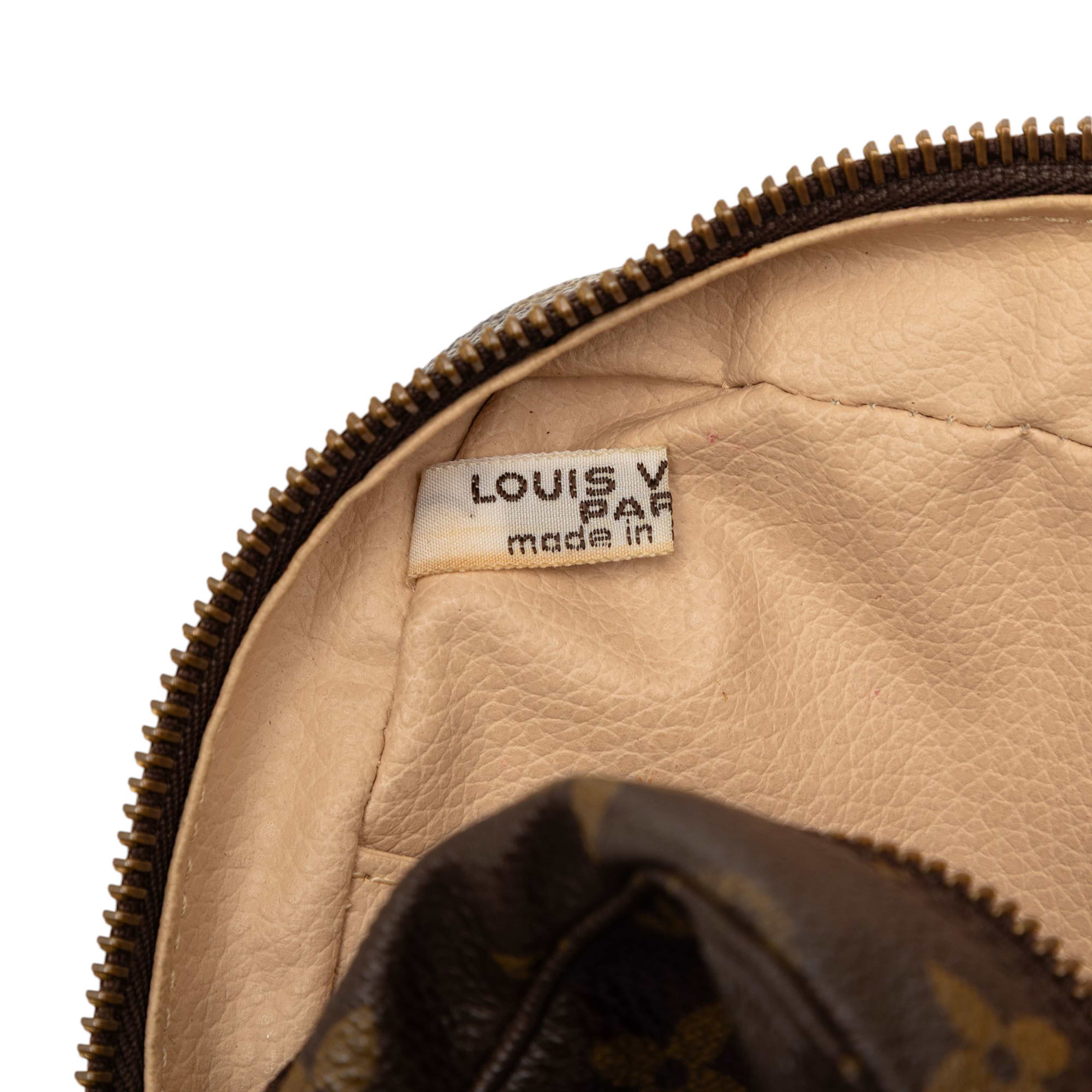 Louis Vuitton Monogram Trousse Toilette 23, från Luxclusif, i färgen brun. Klicka för att öppna bilden i stort format