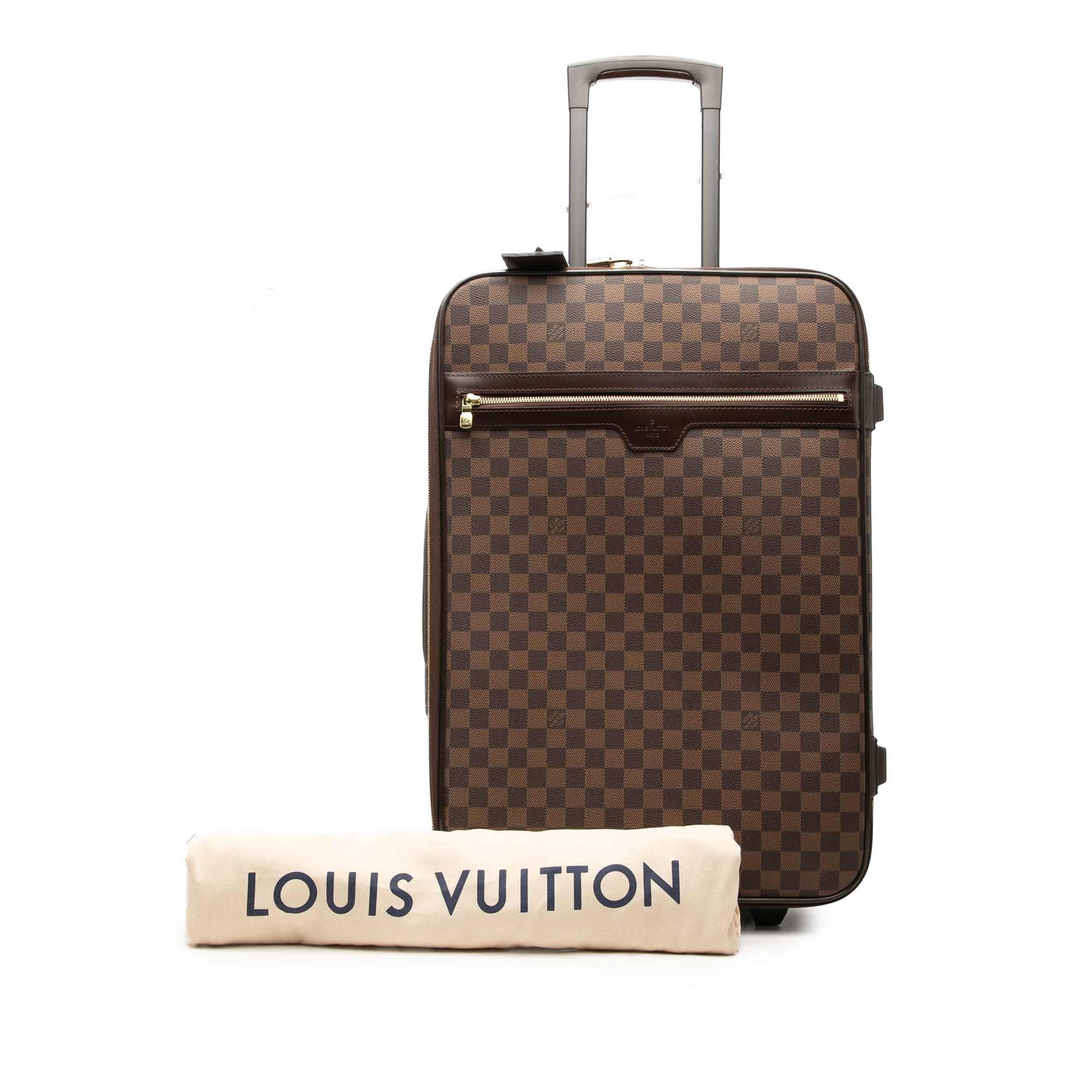 Louis Vuitton Damier Ebene Pegase 55, från Luxclusif, i färgen brun. Klicka för att öppna bilden i stort format