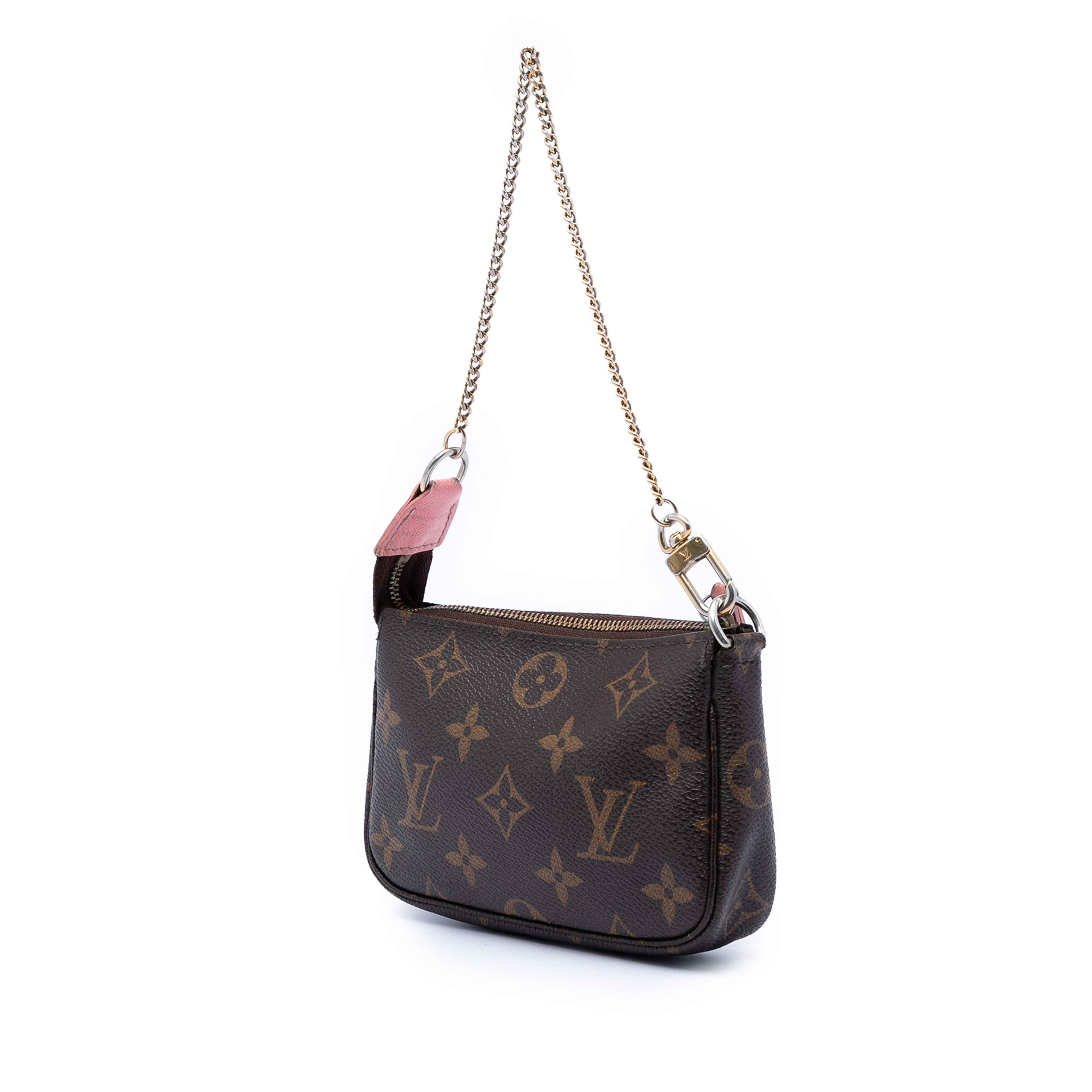 Louis Vuitton Monogram Illustre Mini Pochette Accessories, från Luxclusif, i färgen brun. Klicka för att öppna bilden i stort format