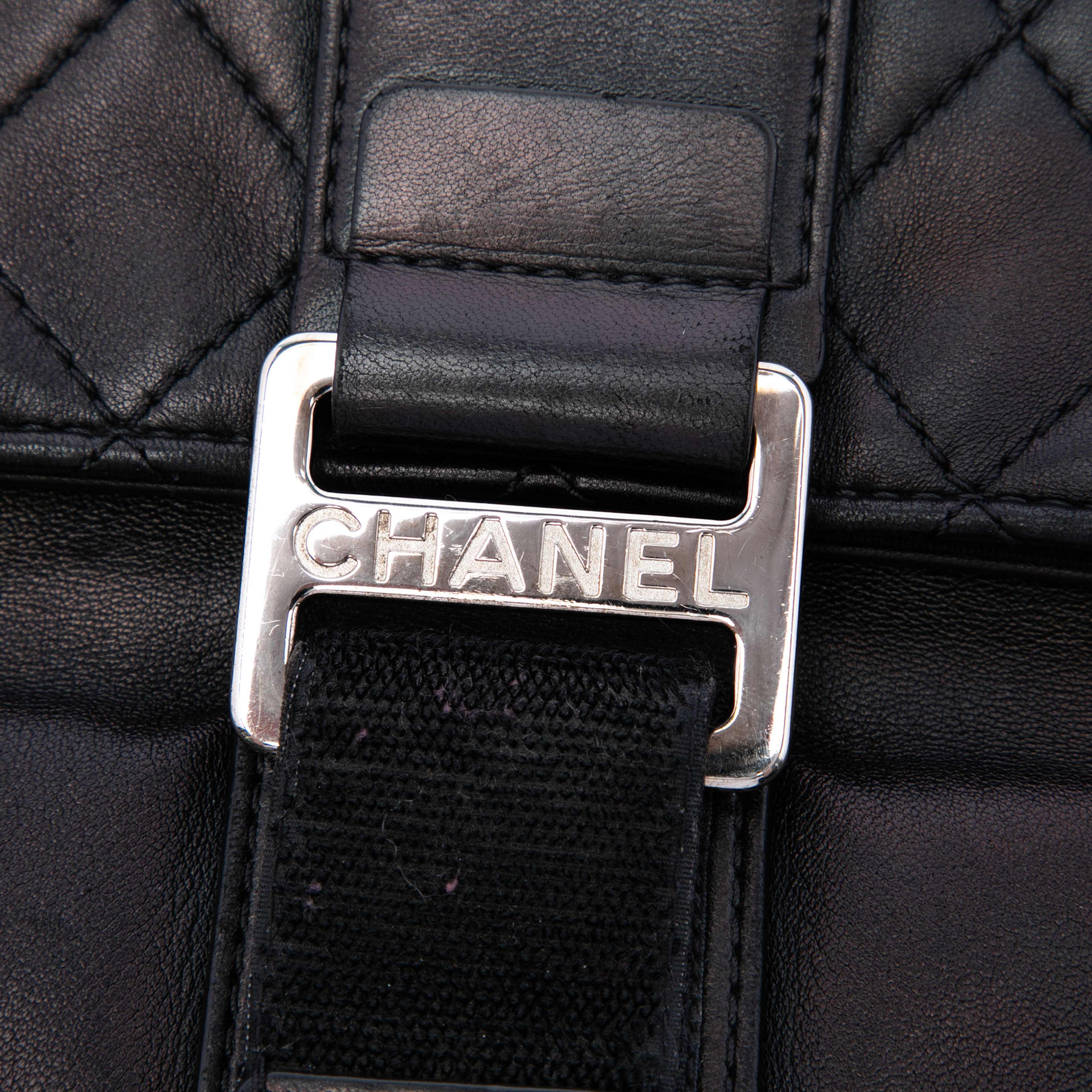 Chanel Quilted Lambskin Grip Clutch, från Luxclusif, i färgen svart. Klicka för att öppna bilden i stort format