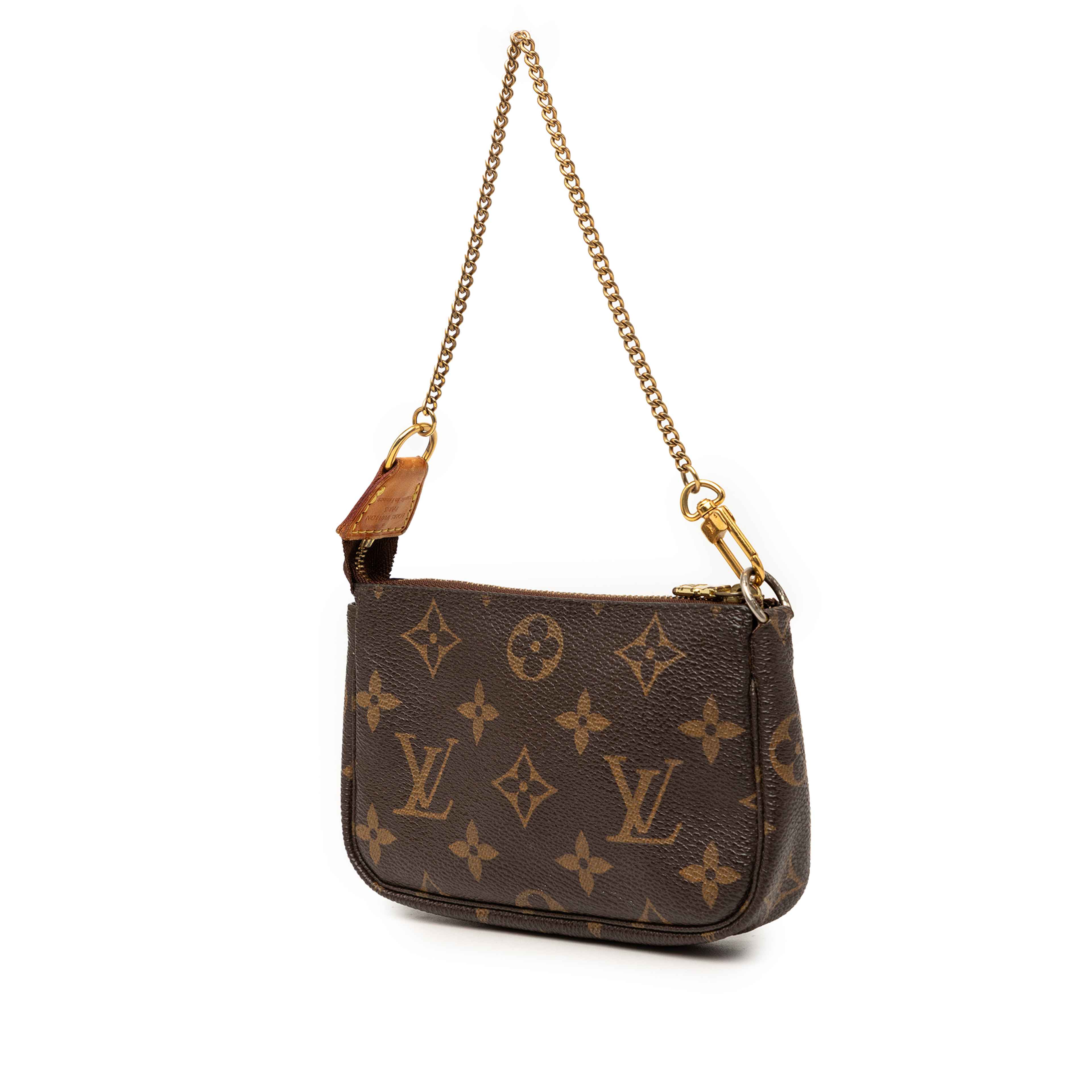 Louis Vuitton Monogram Mini Pochette Accessoires, från Luxclusif, i färgen brun. Klicka för att öppna bilden i stort format