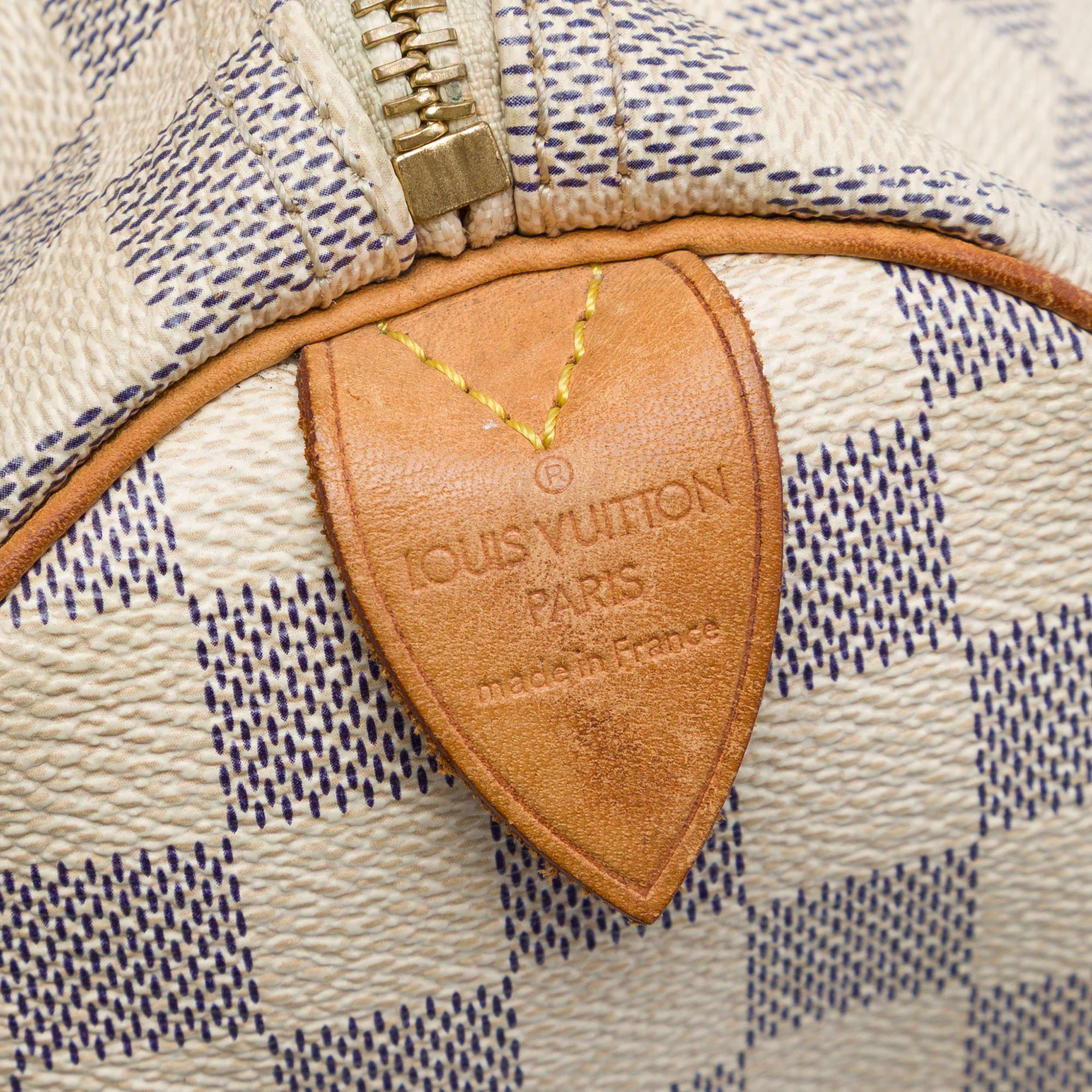 Louis Vuitton Damier Azur Speedy 25, från Luxclusif, i färgen vit. Klicka för att öppna bilden i stort format