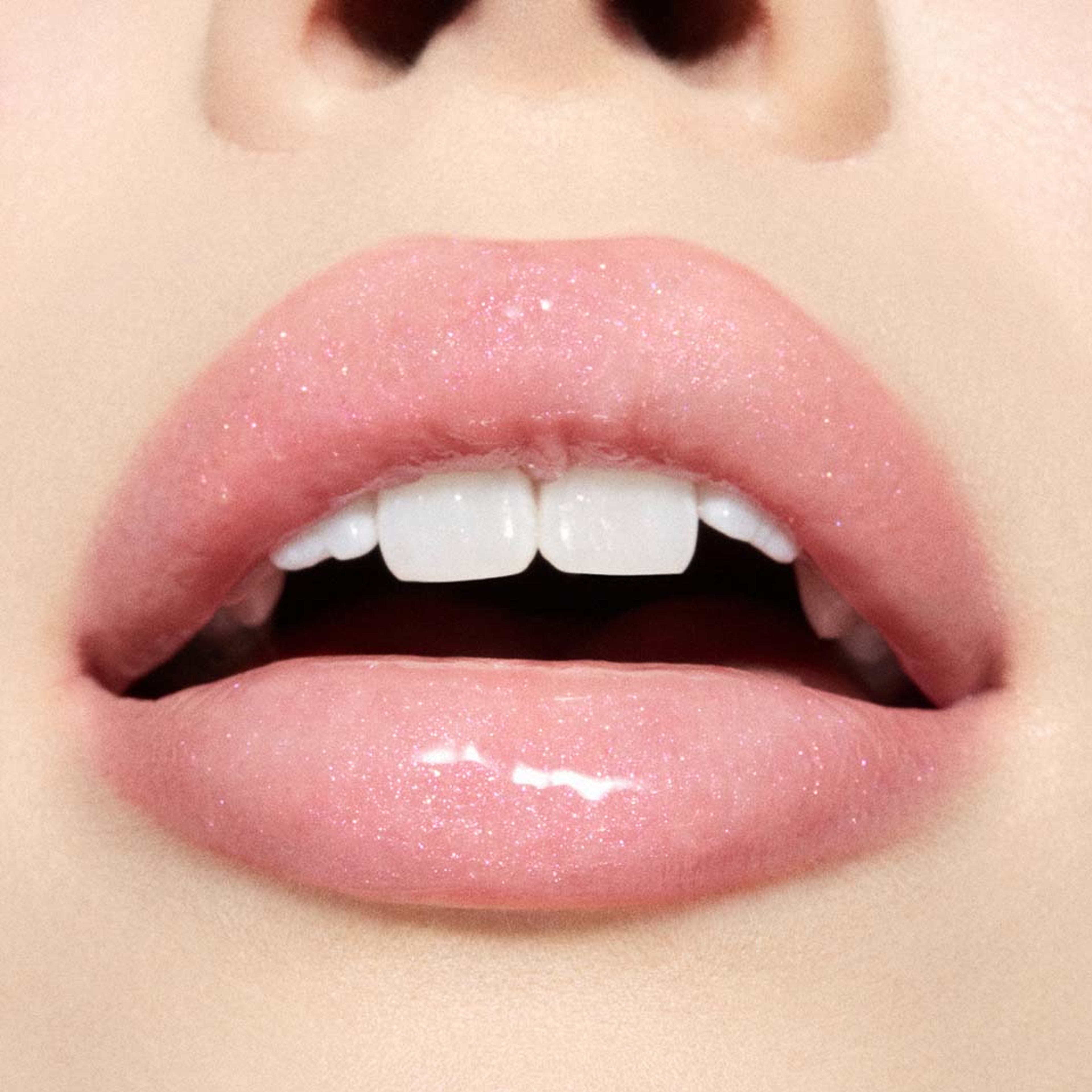 Squirt Plumping Shimmer Lipgloss Stick, från MAC Cosmetics, i färgen Ruby Sparks. Klicka för att öppna bilden i stort format