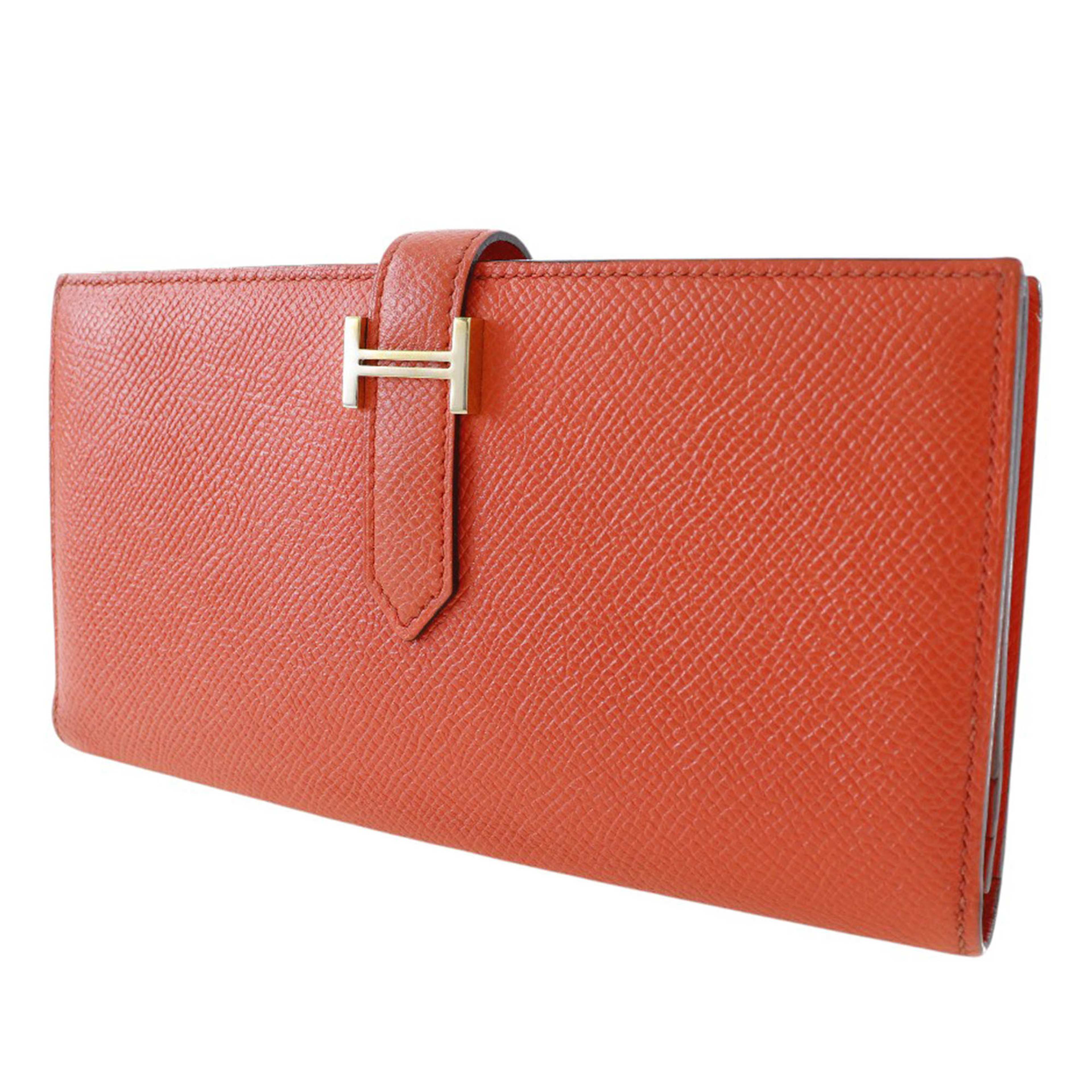 Hermès Epsom Bearn Soufflet Wallet, från Luxclusif, i färgen dark orange. Klicka för att öppna bilden i stort format