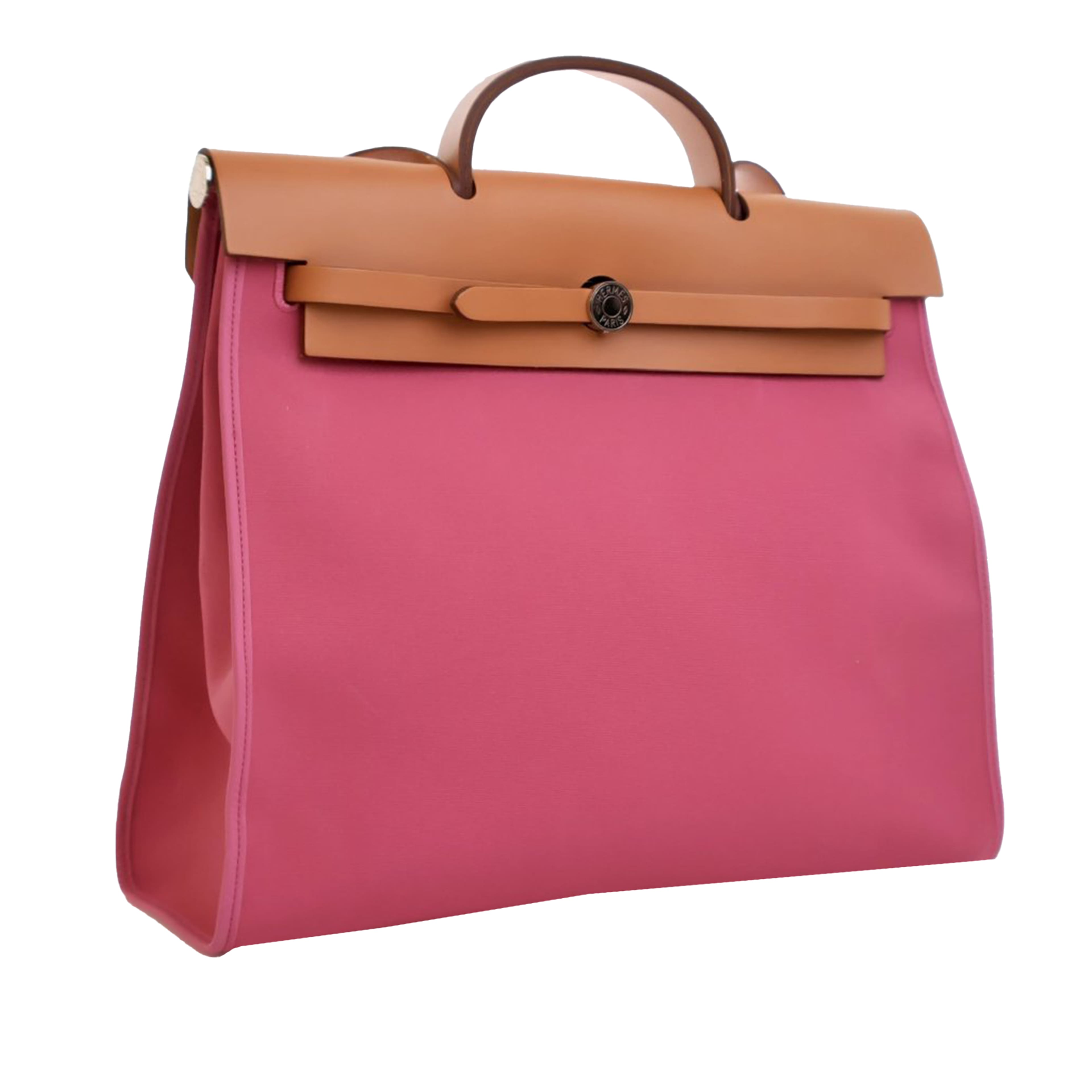 Hermès Toile Herbag Zip 39, från Luxclusif, i färgen pink. Klicka för att öppna bilden i stort format
