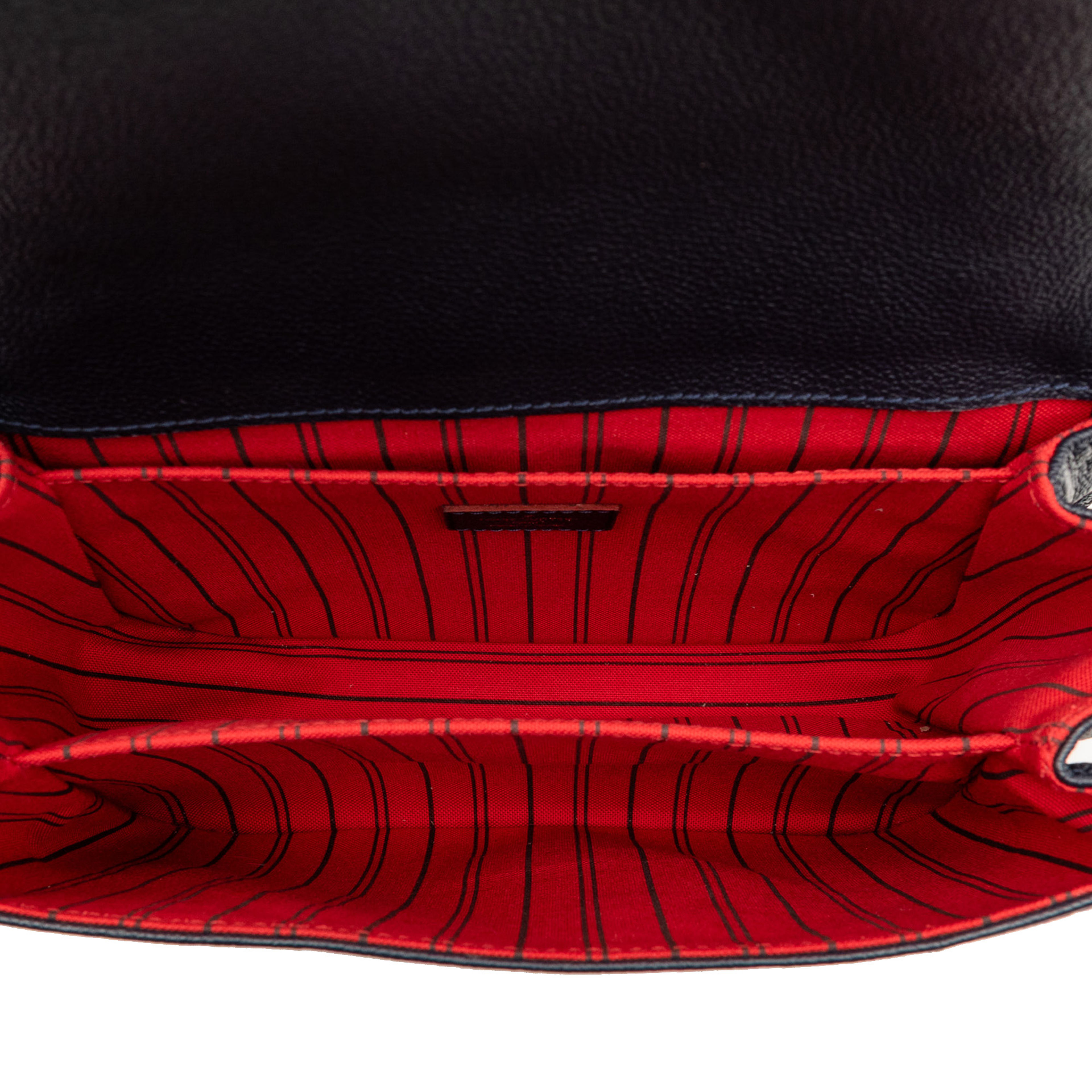 Louis Vuitton Monogram Empreinte Pochette Metis, från Luxclusif, i färgen navy. Klicka för att öppna bilden i stort format