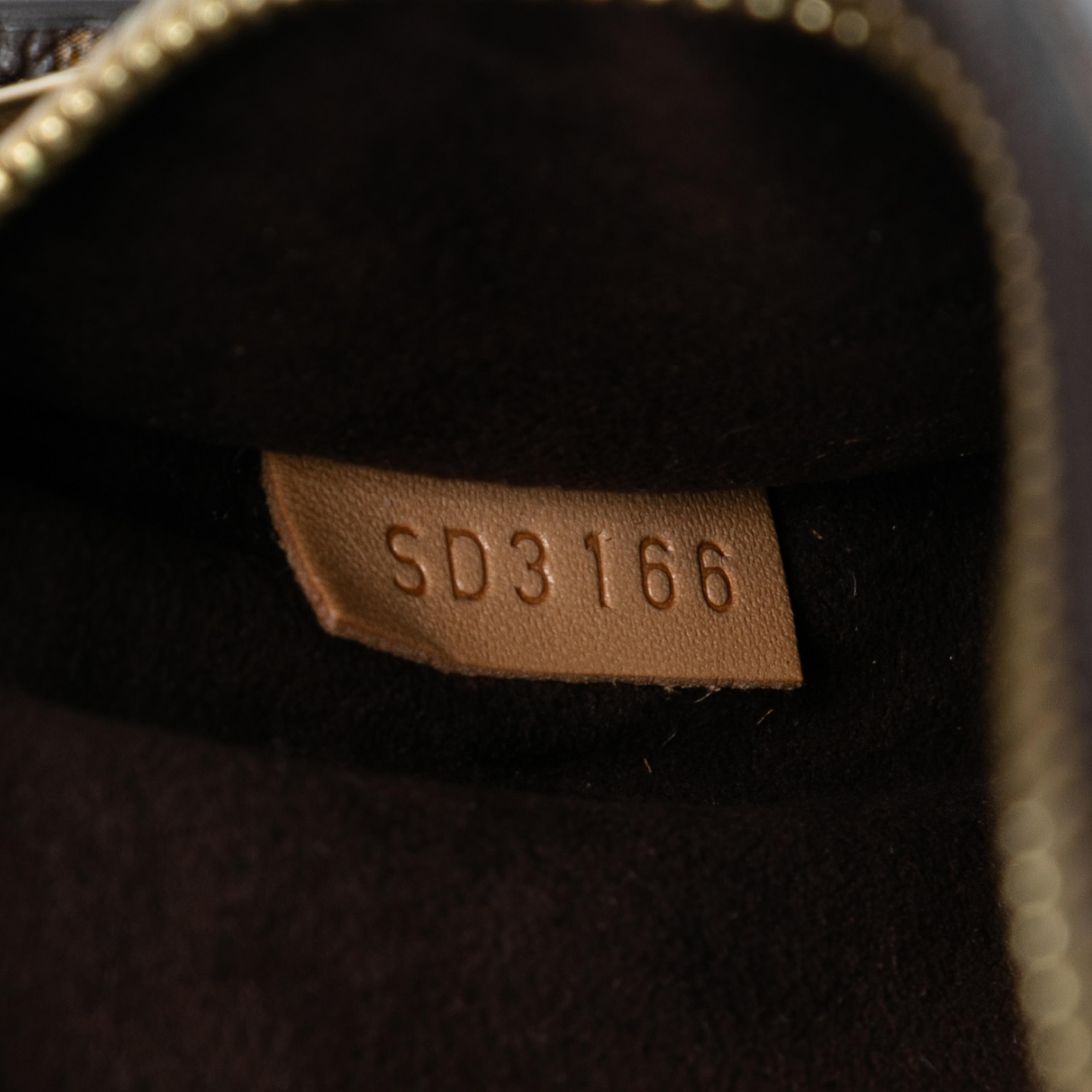 Louis Vuitton Monogram Pochette Metis, från Luxclusif, i färgen brun. Klicka för att öppna bilden i stort format