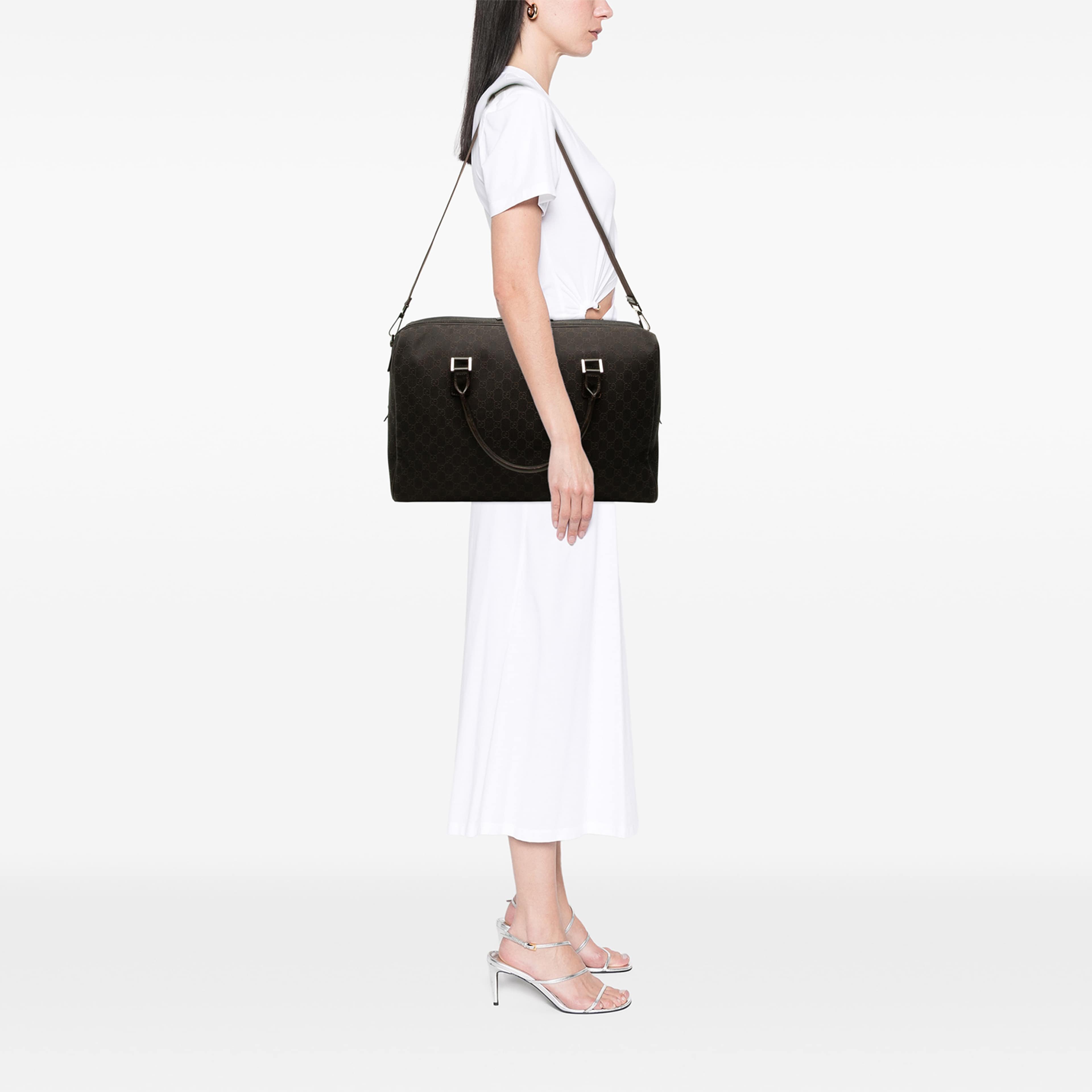 Gucci Gg Denim Travel Bag, från Luxclusif, i färgen brun. Klicka för att öppna bilden i stort format
