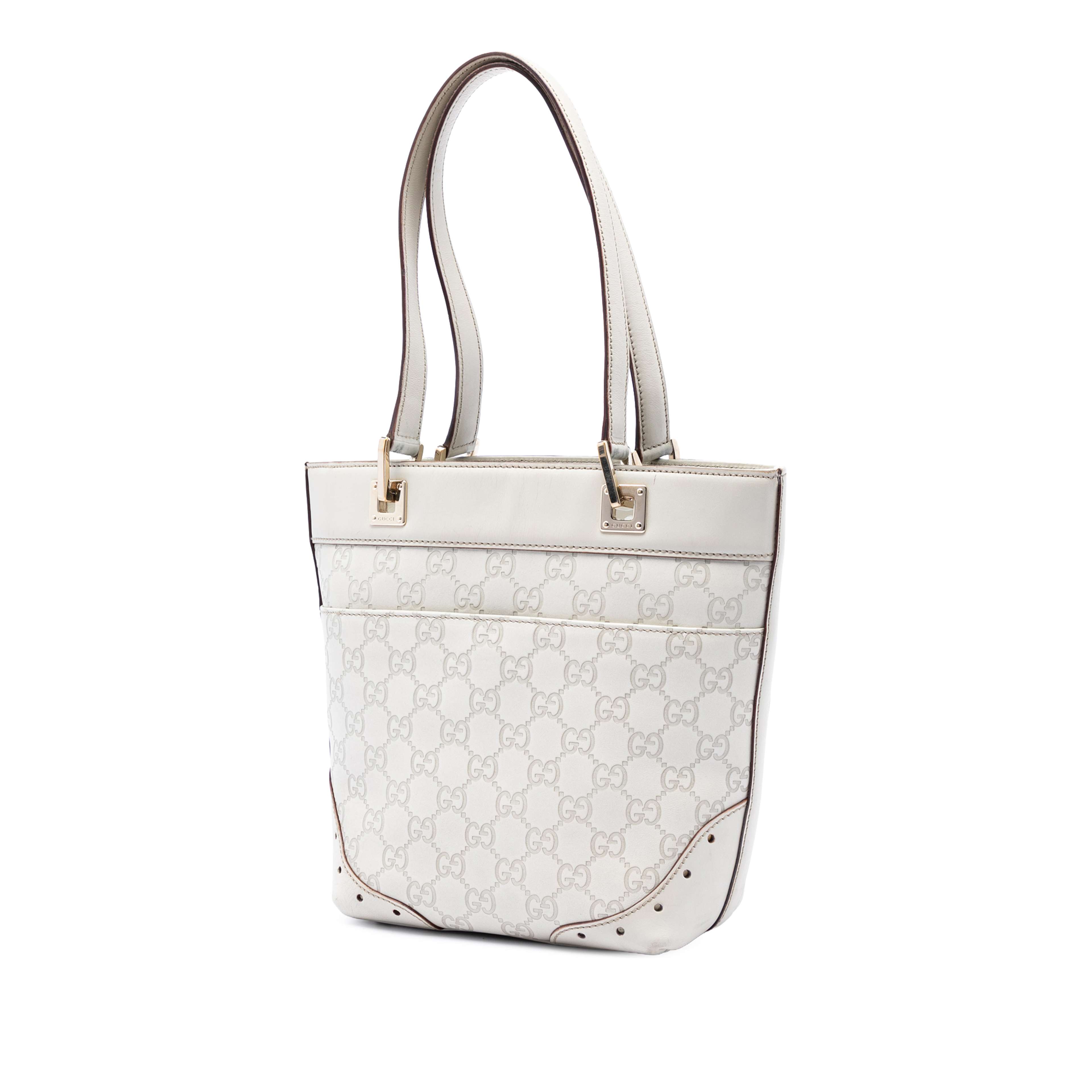 Gucci Mini Guccissima Punch Tote, från Luxclusif, i färgen vit. Klicka för att öppna bilden i stort format