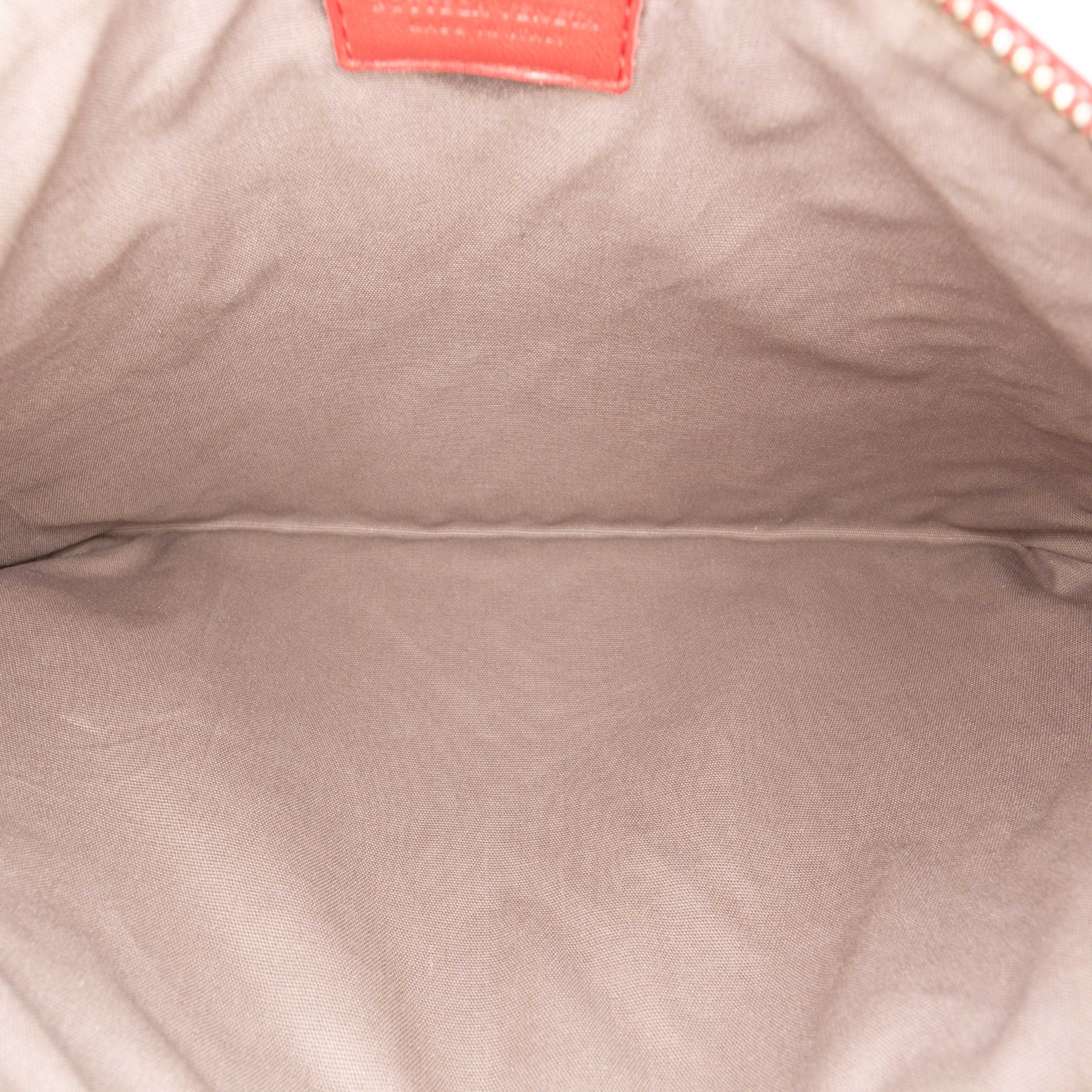 Bottega Veneta Nappa Intrecciato Clutch, från Luxclusif, i färgen red. Klicka för att öppna bilden i stort format