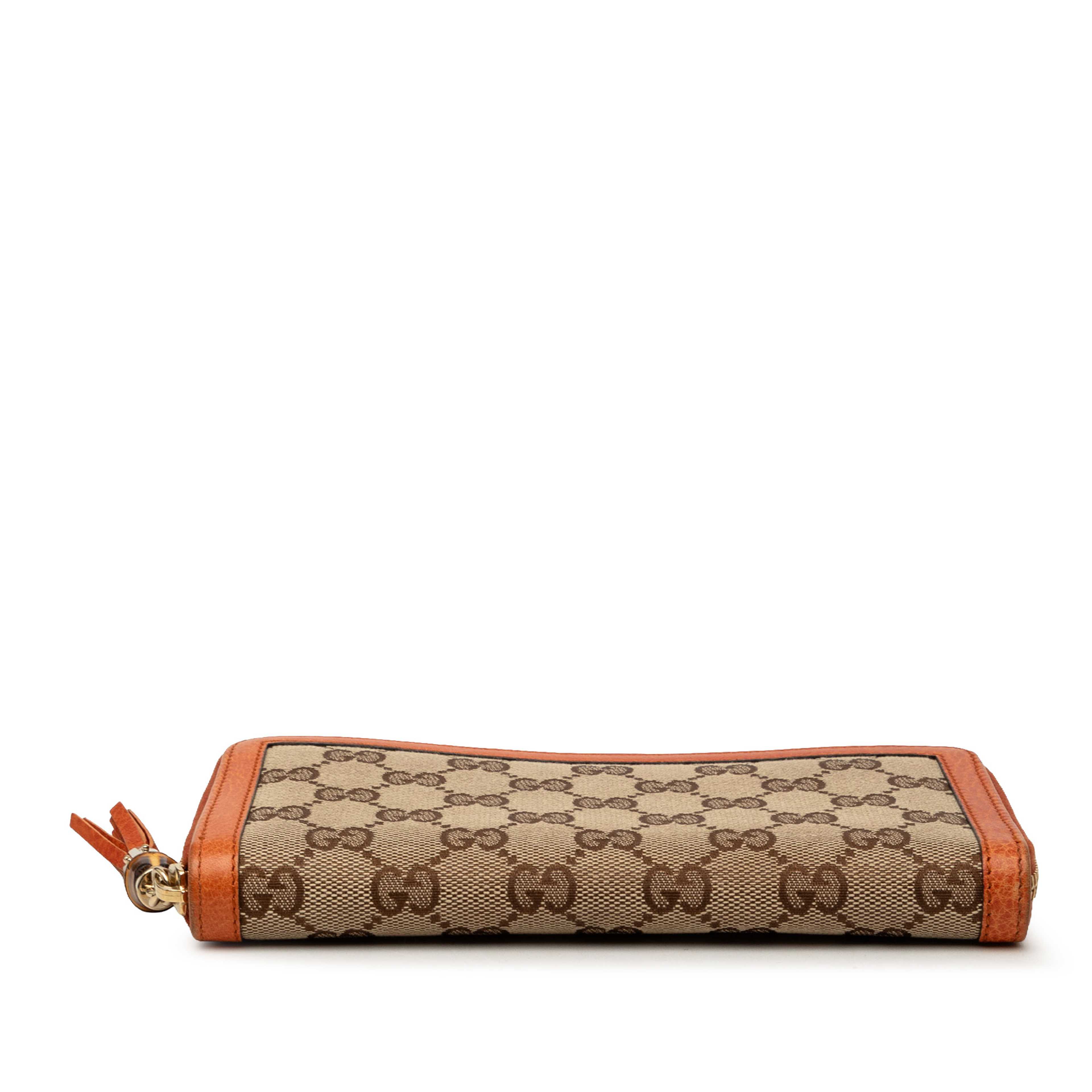 Gucci Gg Canvas Bamboo Tassel Zip Around Long Wallet, från Luxclusif, i färgen orange. Klicka för att öppna bilden i stort format