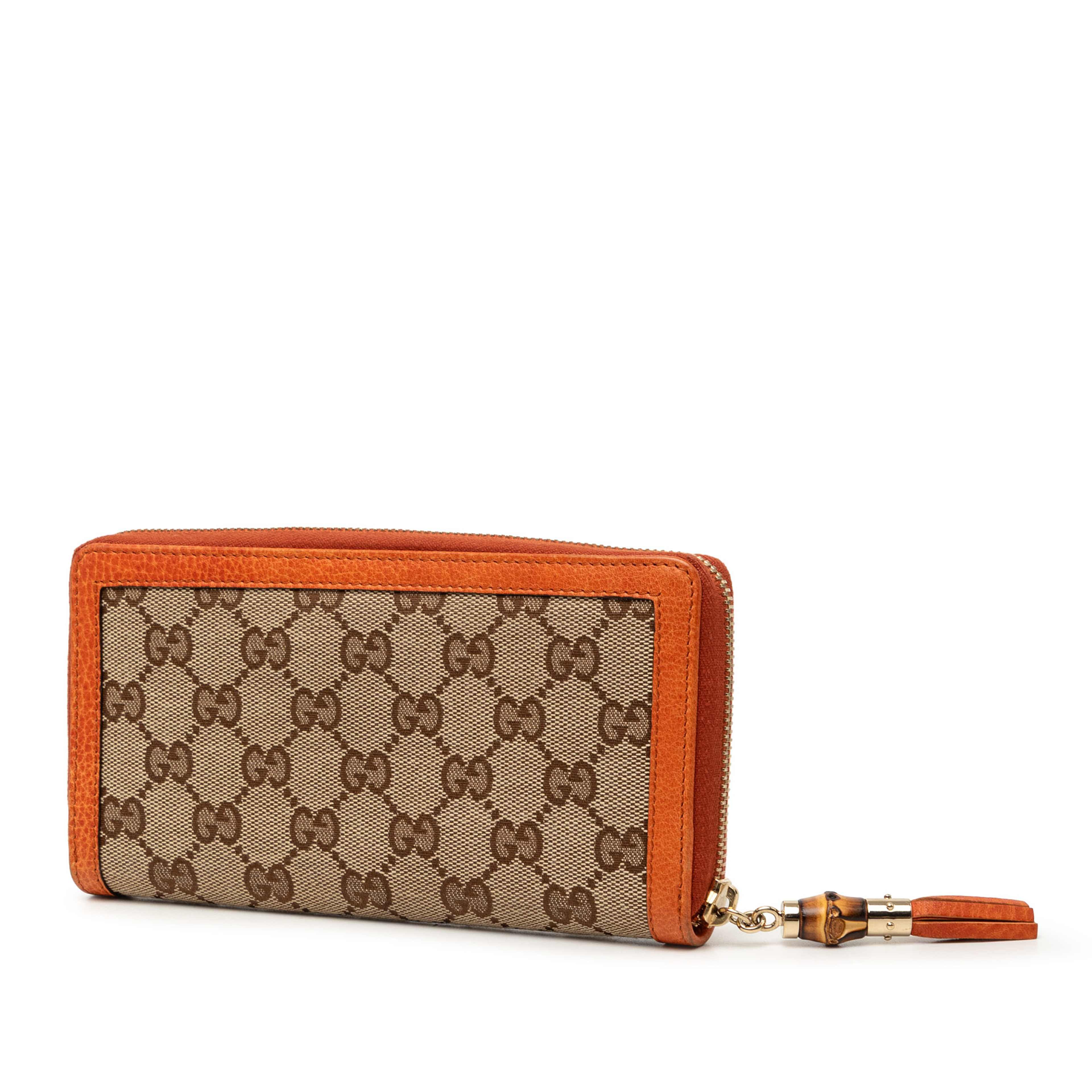 Gucci Gg Canvas Bamboo Tassel Zip Around Long Wallet, från Luxclusif, i färgen orange. Klicka för att öppna bilden i stort format