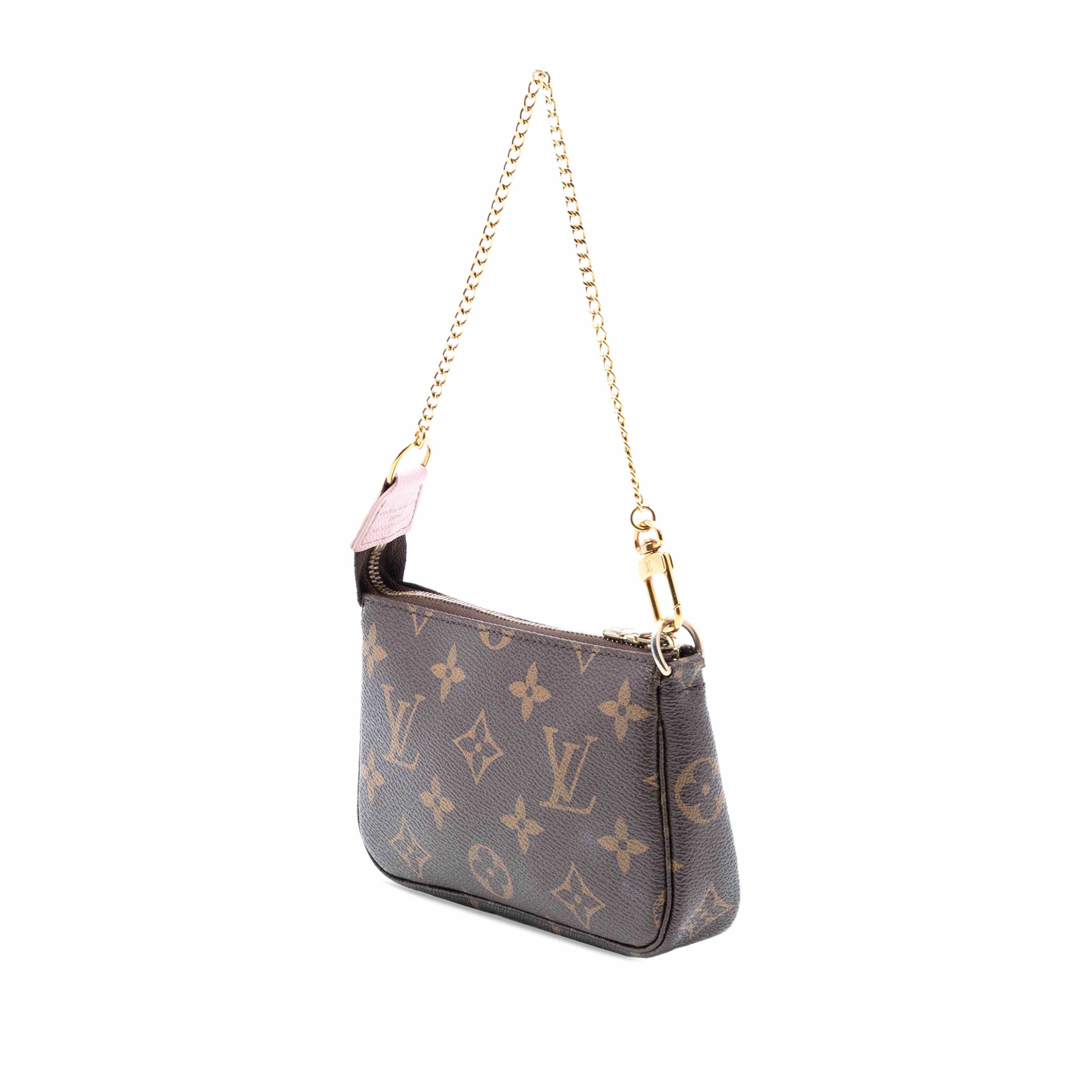 Louis Vuitton Monogram Transatlantic Mini Pochette Accessoires, från Luxclusif, i färgen brown. Klicka för att öppna bilden i stort format