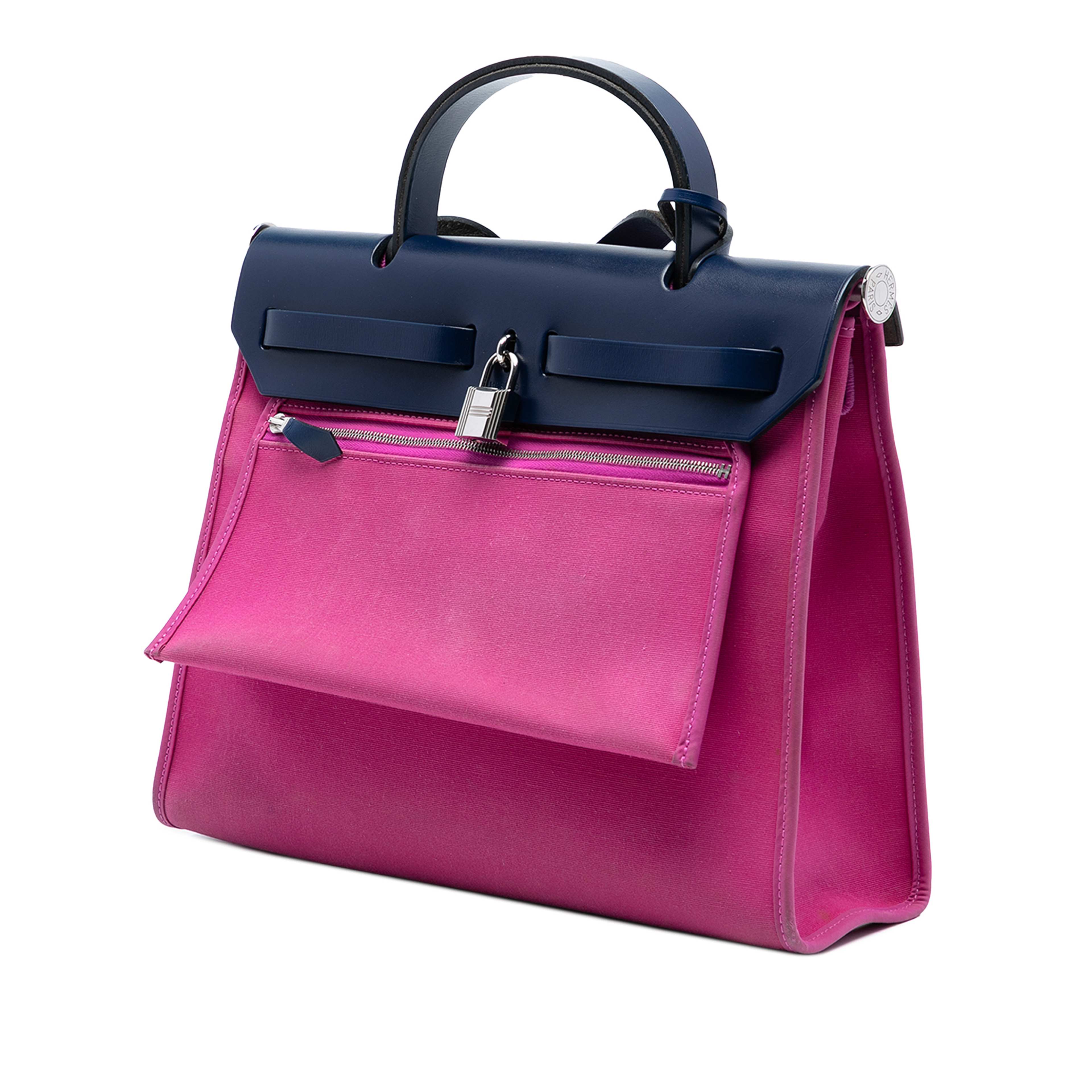 Hermès Toile Herbag Zip 31, från Luxclusif, i färgen hot pink. Klicka för att öppna bilden i stort format