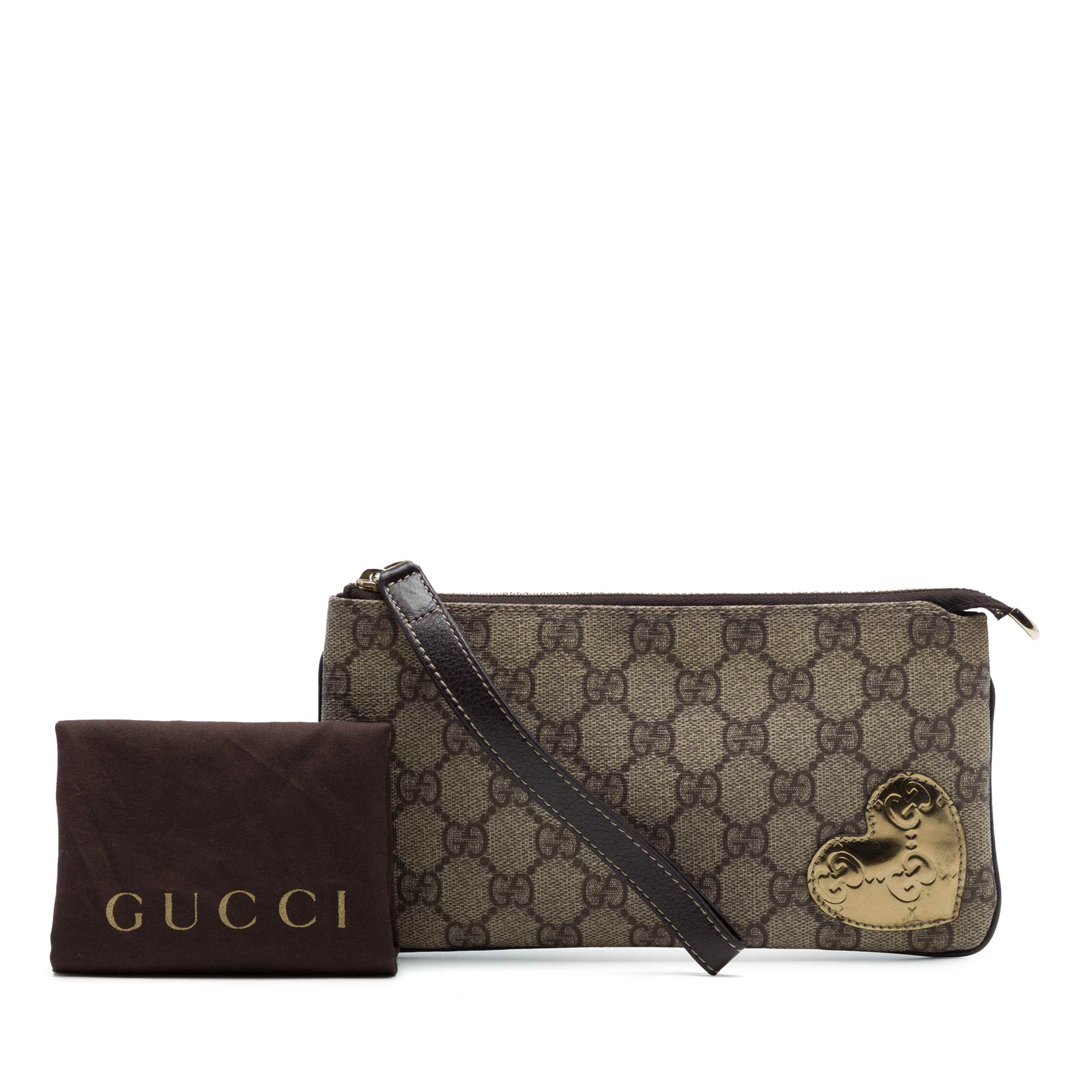 Gucci Guccissima Heart Trimmed Gg Supreme Wristlet Clutch, från Luxclusif, i färgen brun. Klicka för att öppna bilden i stort format