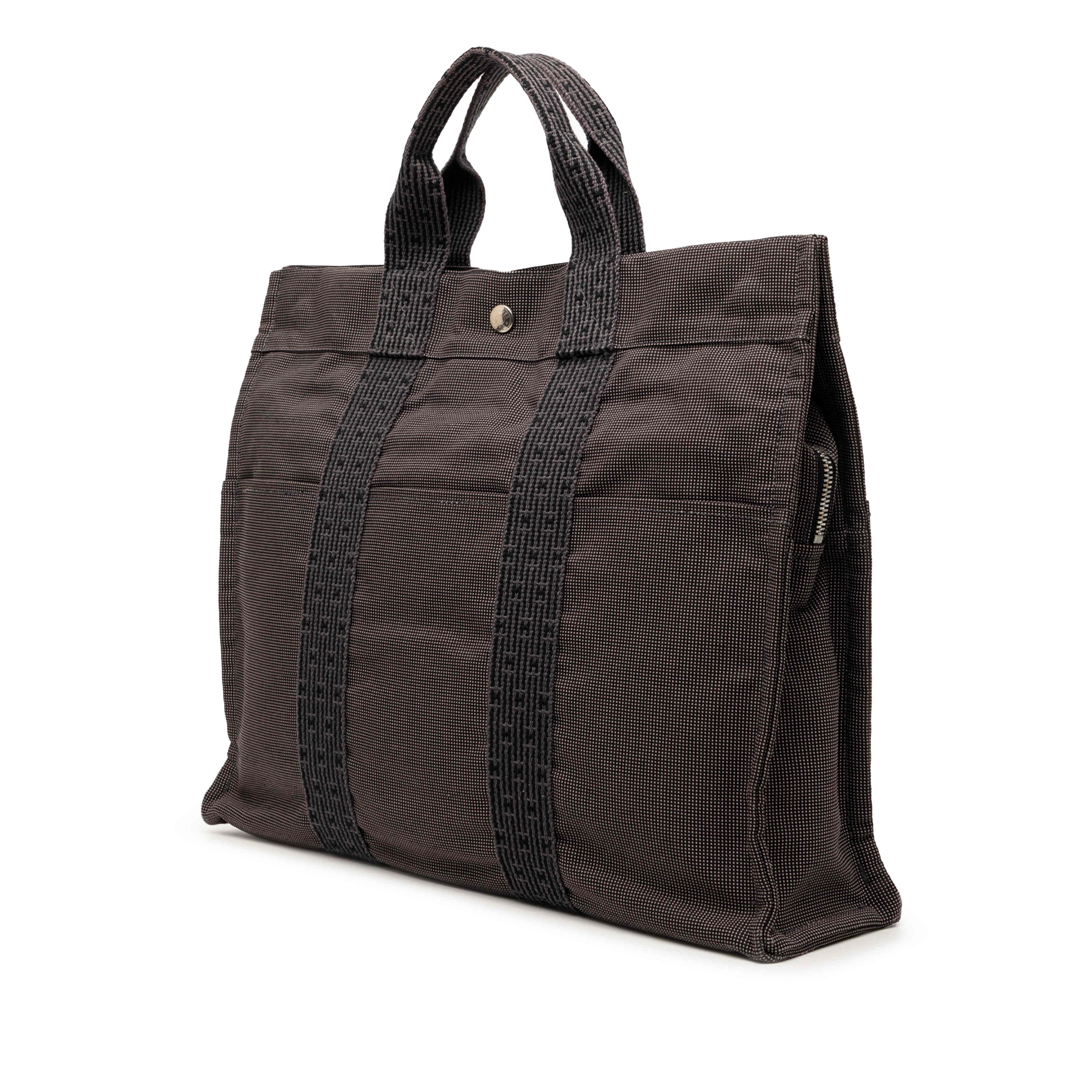 Hermès Canvas Herline Mm, från Luxclusif, i färgen dark gray. Klicka för att öppna bilden i stort format