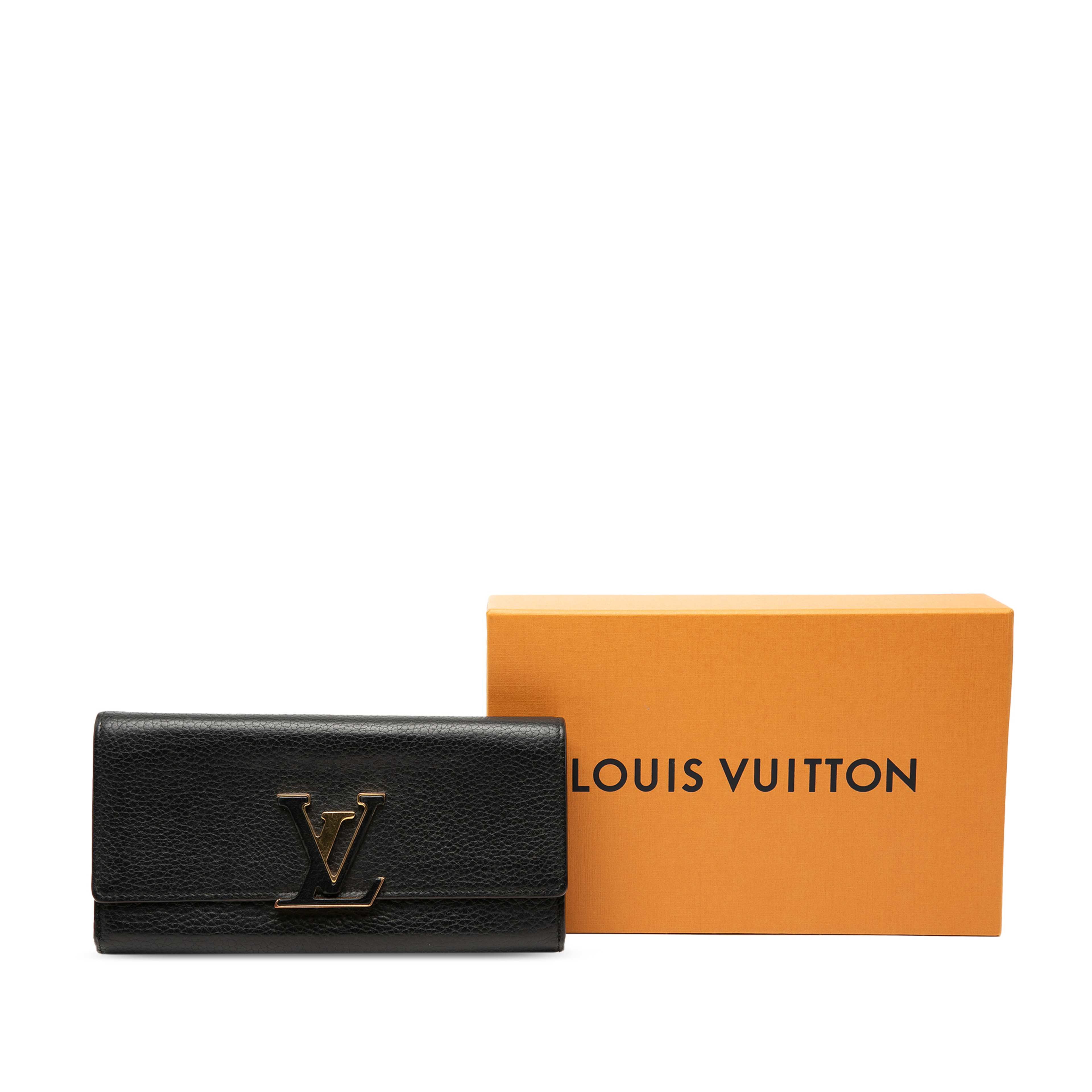 Louis Vuitton Taurillon Capucines Long Wallet, från Luxclusif, i färgen svart. Klicka för att öppna bilden i stort format