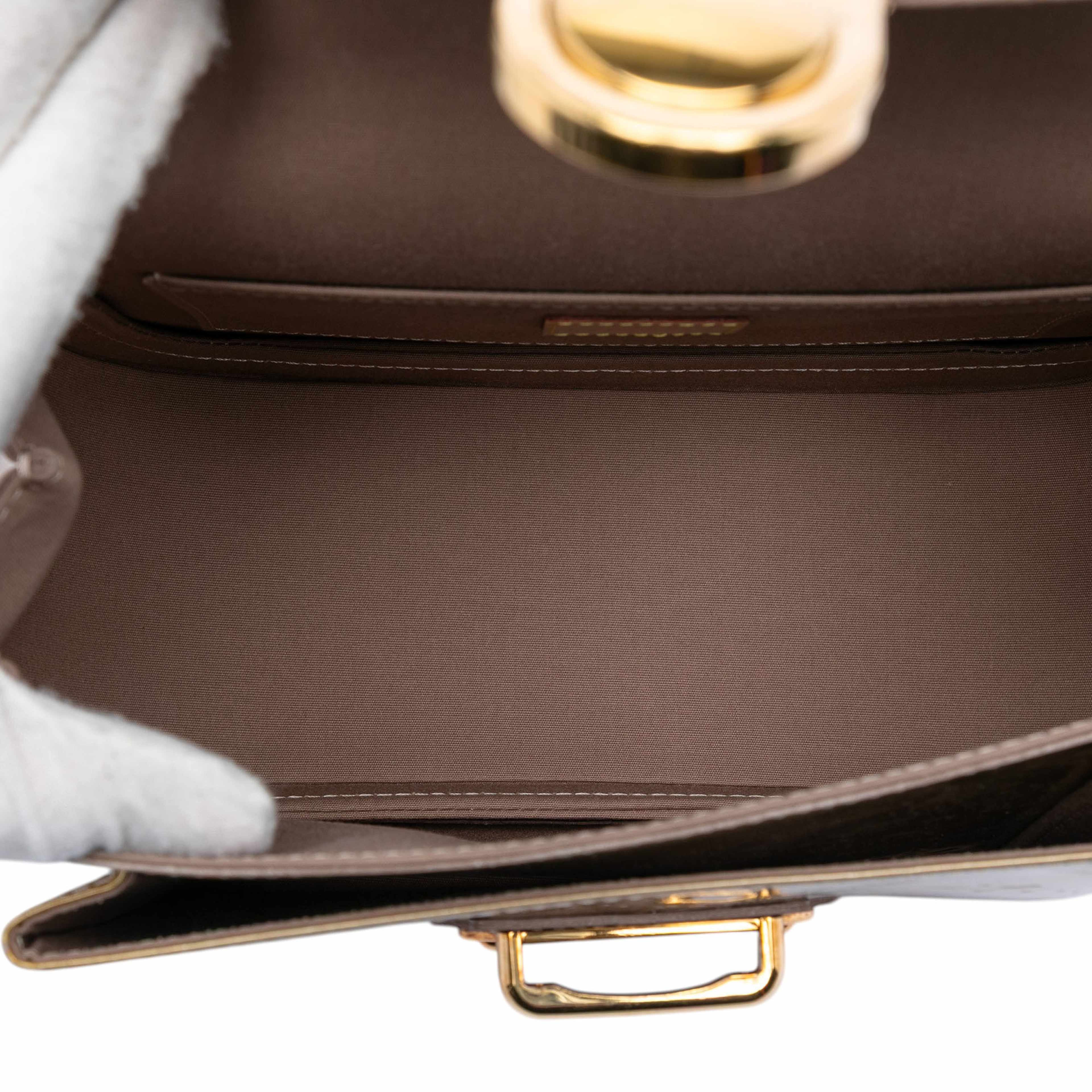Louis Vuitton Monogram Vernis Mirada, från Luxclusif, i färgen gold. Klicka för att öppna bilden i stort format