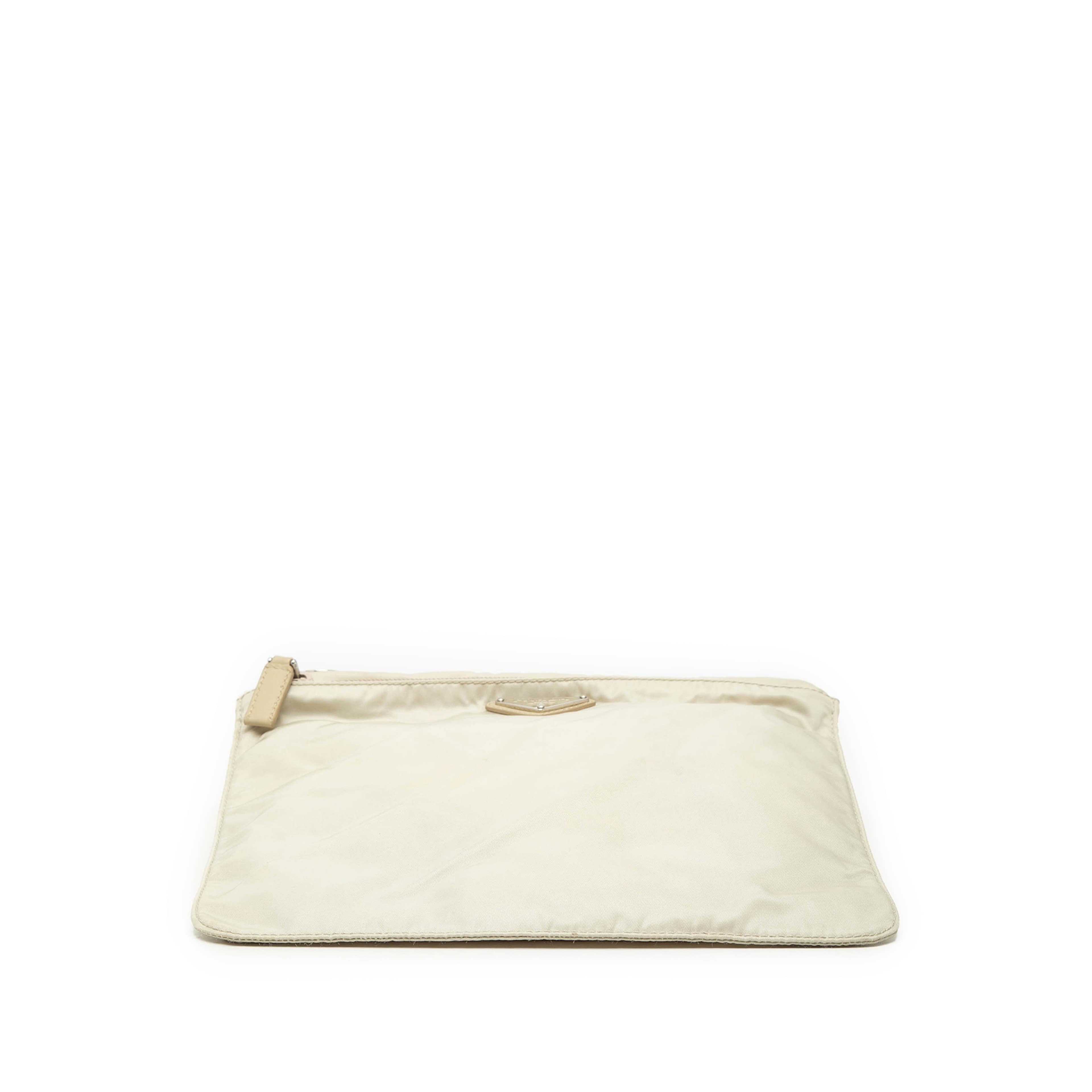 Prada Tessuto Zip Top Crossbody, från Luxclusif, i färgen beige. Klicka för att öppna bilden i stort format