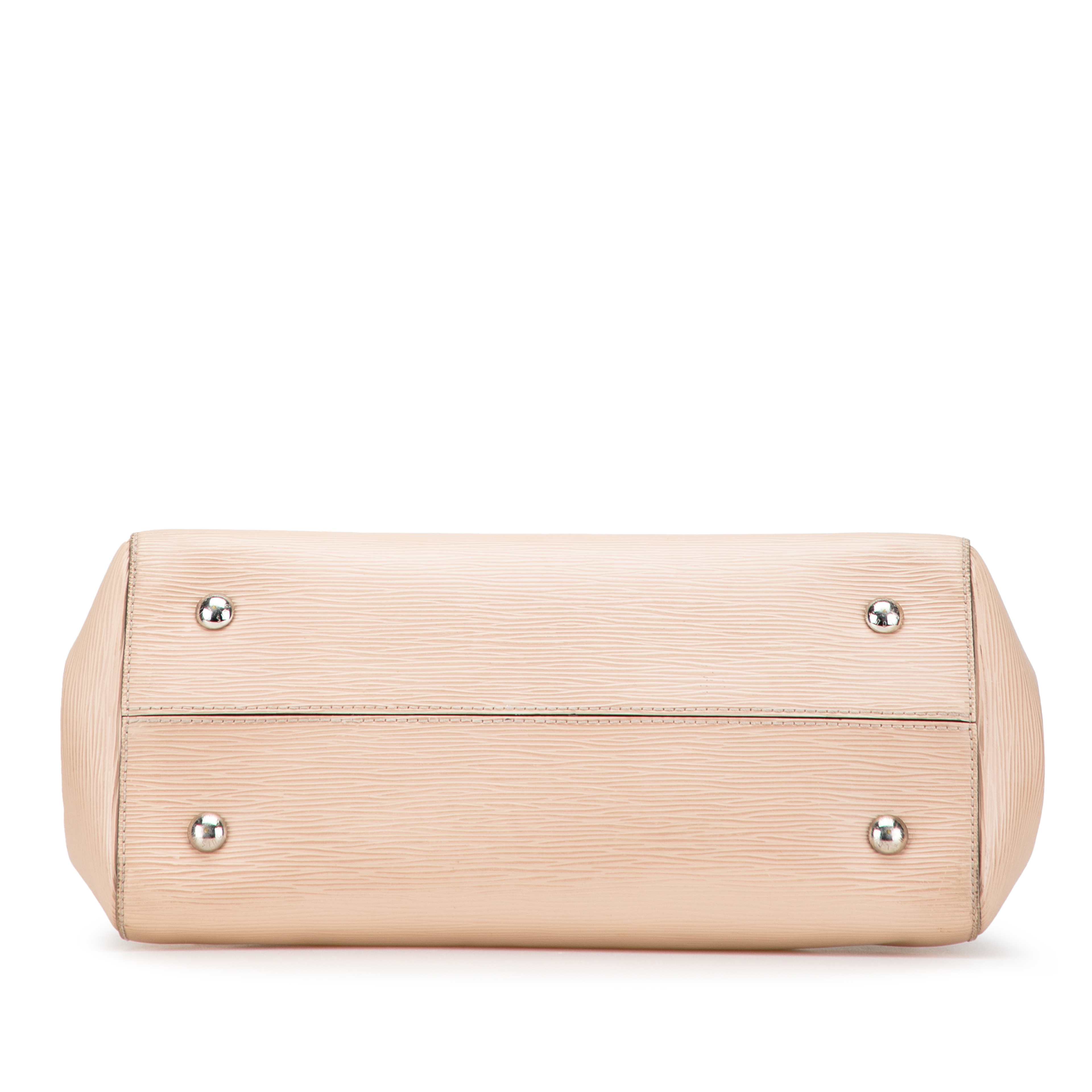 Louis Vuitton Epi Marly Mm, från Luxclusif, i färgen beige. Klicka för att öppna bilden i stort format