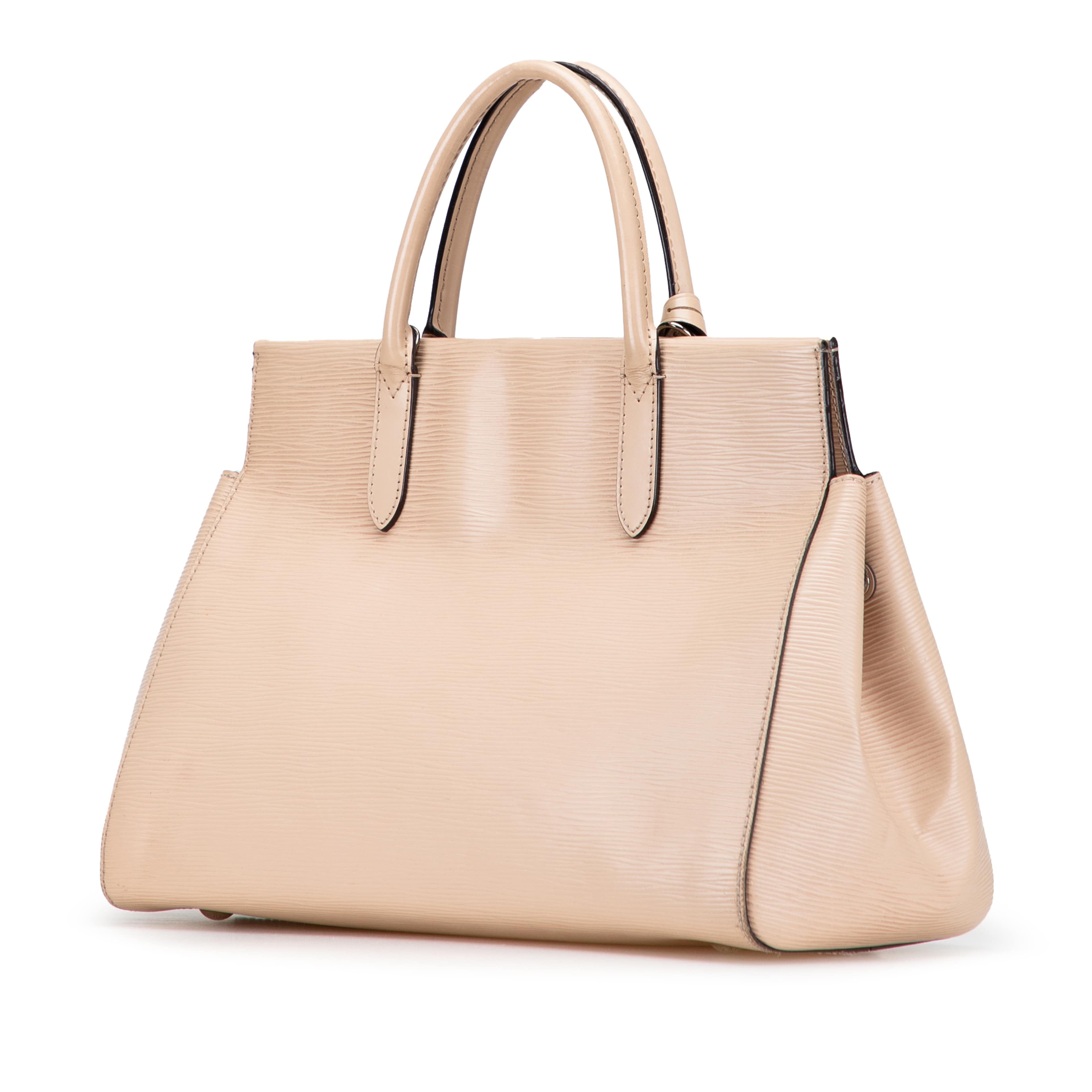 Louis Vuitton Epi Marly Mm, från Luxclusif, i färgen beige. Klicka för att öppna bilden i stort format