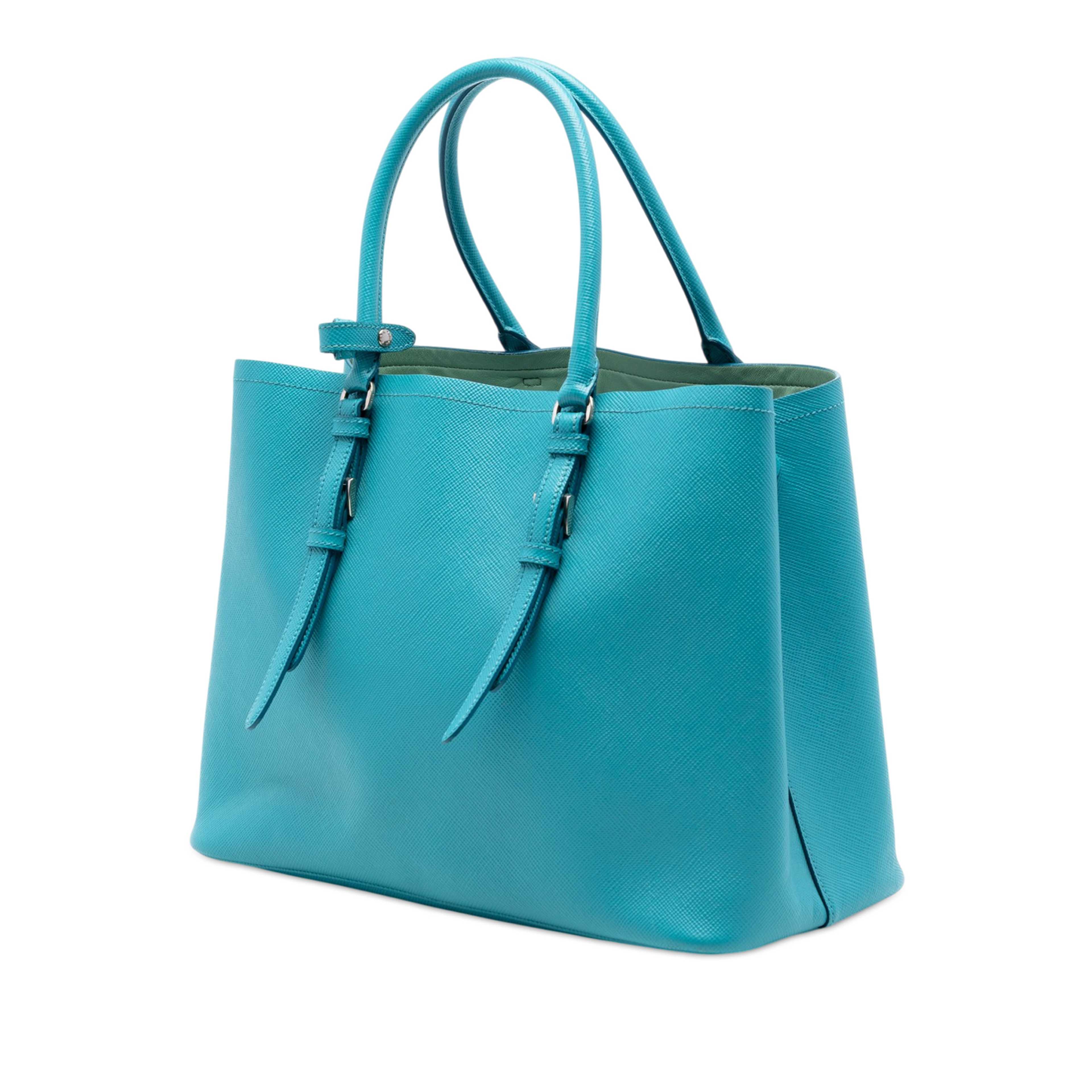 Prada Medium Saffiano Cuir Double Handle Satchel, från Luxclusif, i färgen blå. Klicka för att öppna bilden i stort format
