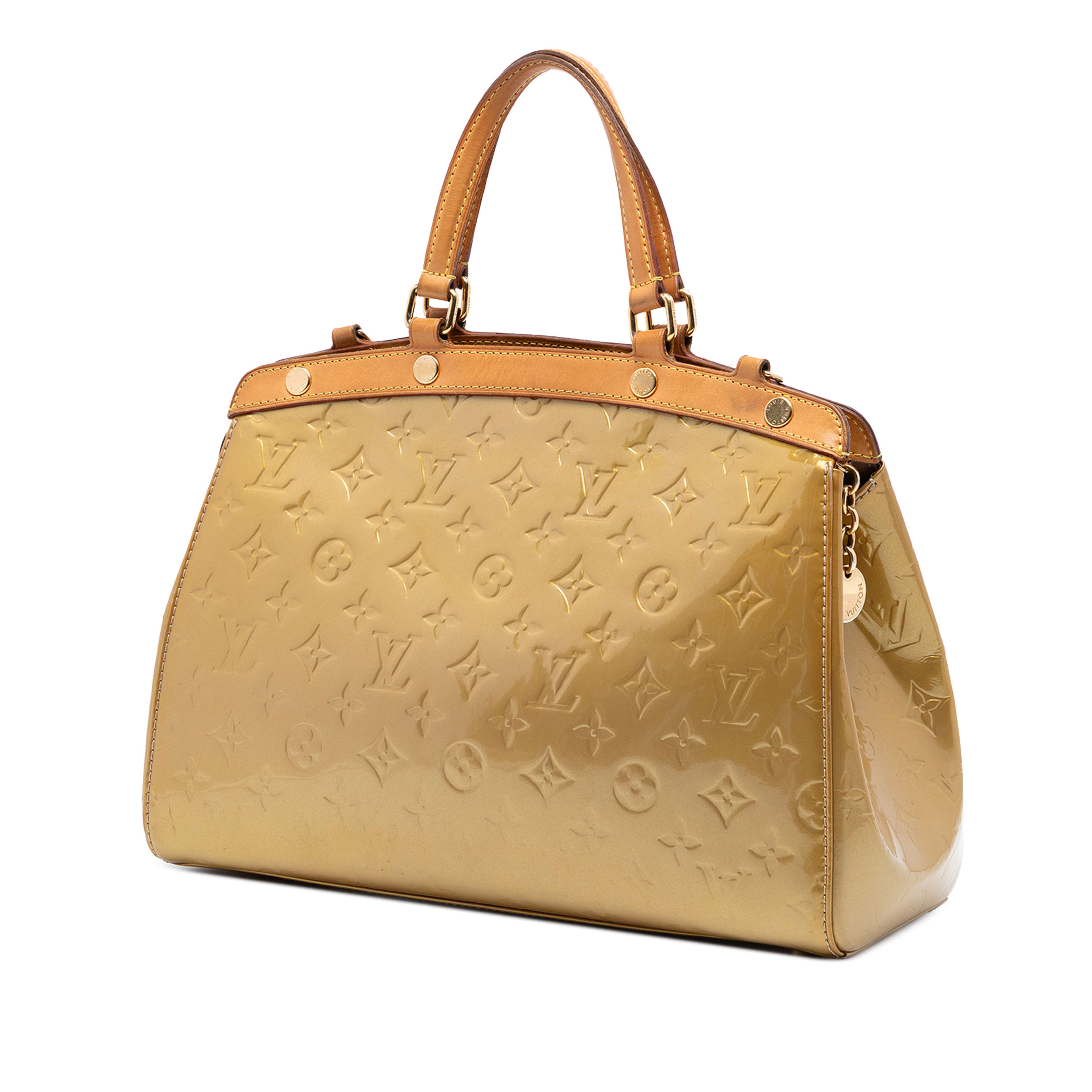 Louis Vuitton Monogram Vernis Brea Mm, från Luxclusif, i färgen gold. Klicka för att öppna bilden i stort format