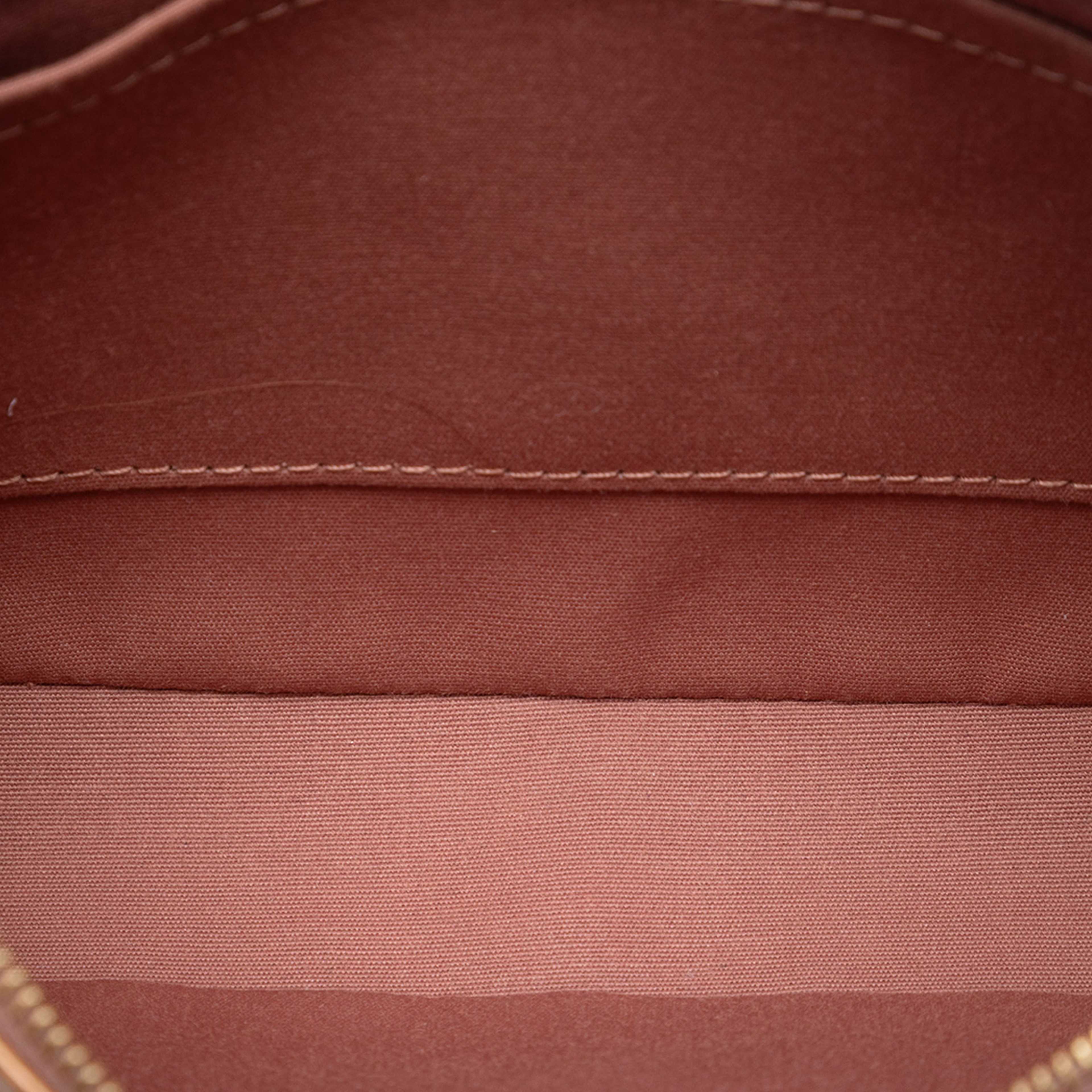 Louis Vuitton Monogram Vernis Pochette Accessoires, från Luxclusif, i färgen brown. Klicka för att öppna bilden i stort format