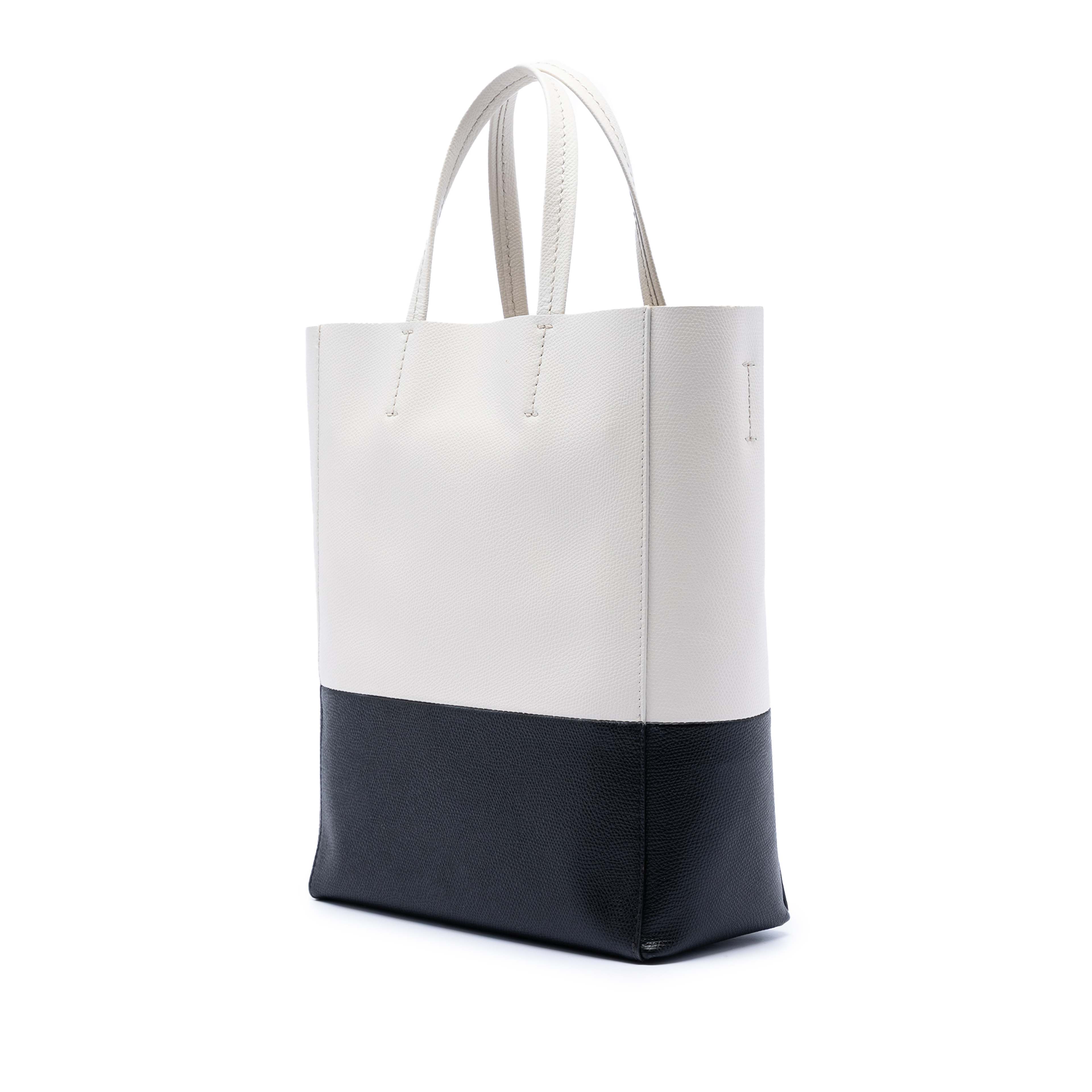 Celine Small Bicolor Grained Calfskin Vertical Cabas Tote, från Luxclusif, i färgen white. Klicka för att öppna bilden i stort format
