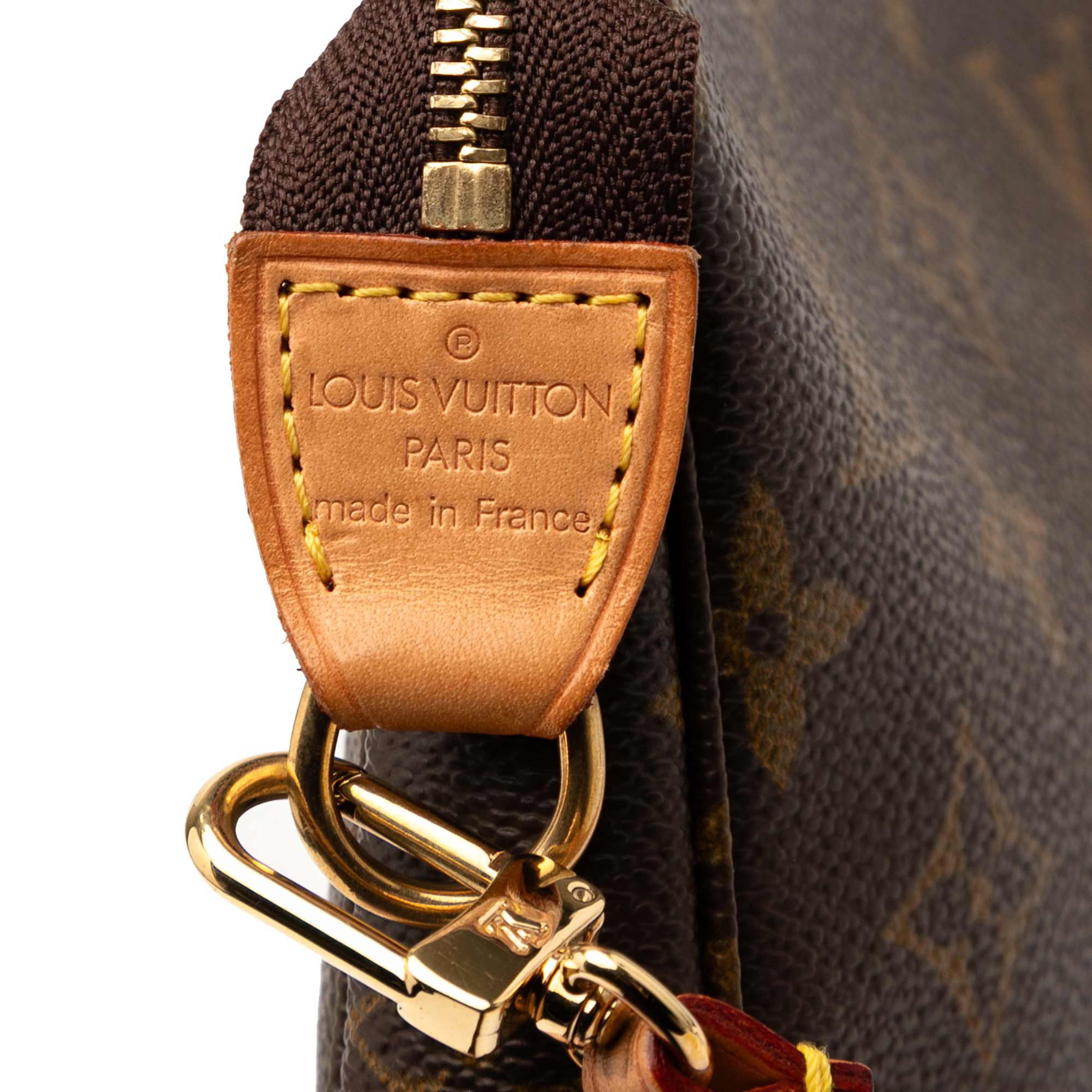 Louis Vuitton Monogram Pochette Accessoires, från Luxclusif, i färgen brown. Klicka för att öppna bilden i stort format