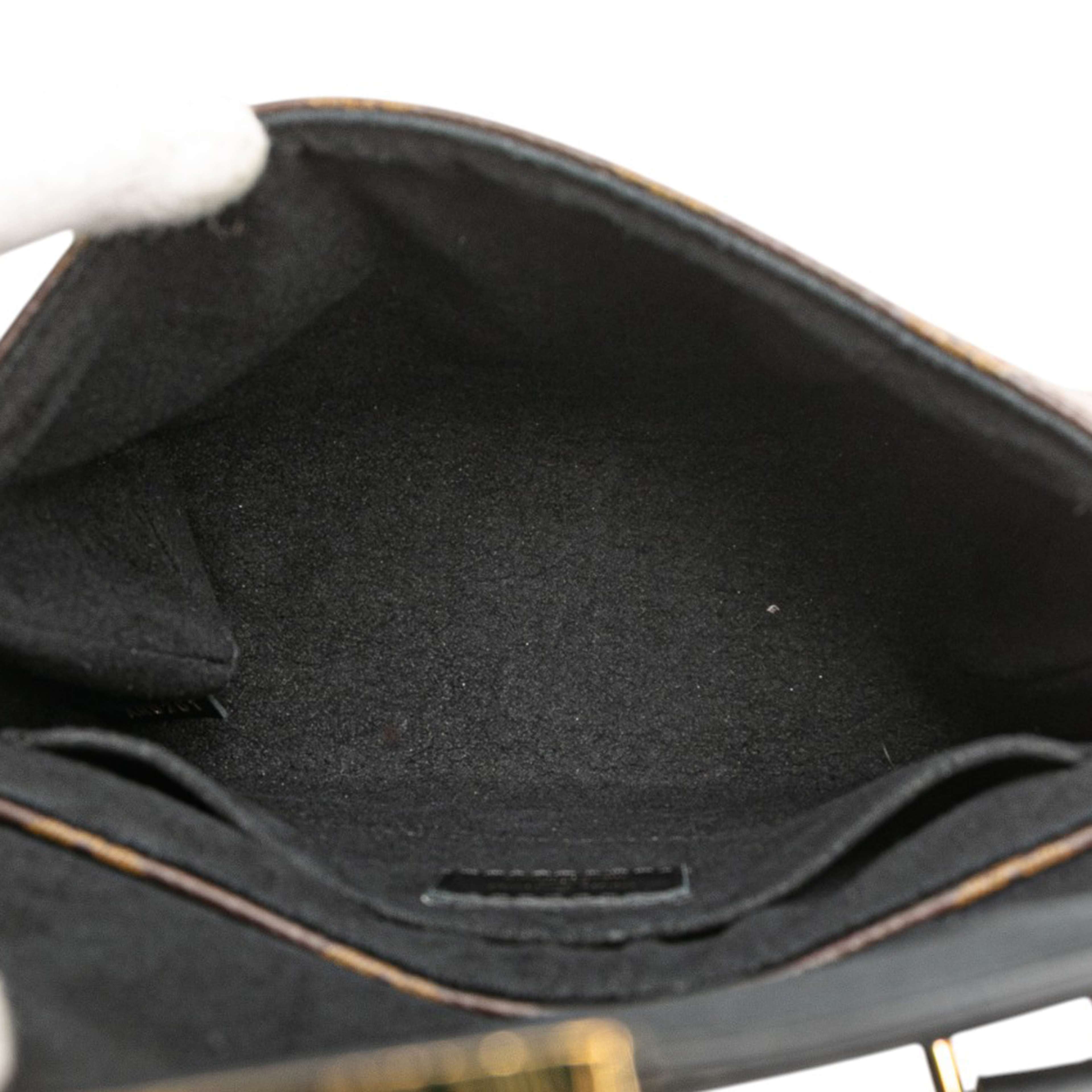 Louis Vuitton Monogram Locky Bb, från Luxclusif, i färgen brown. Klicka för att öppna bilden i stort format