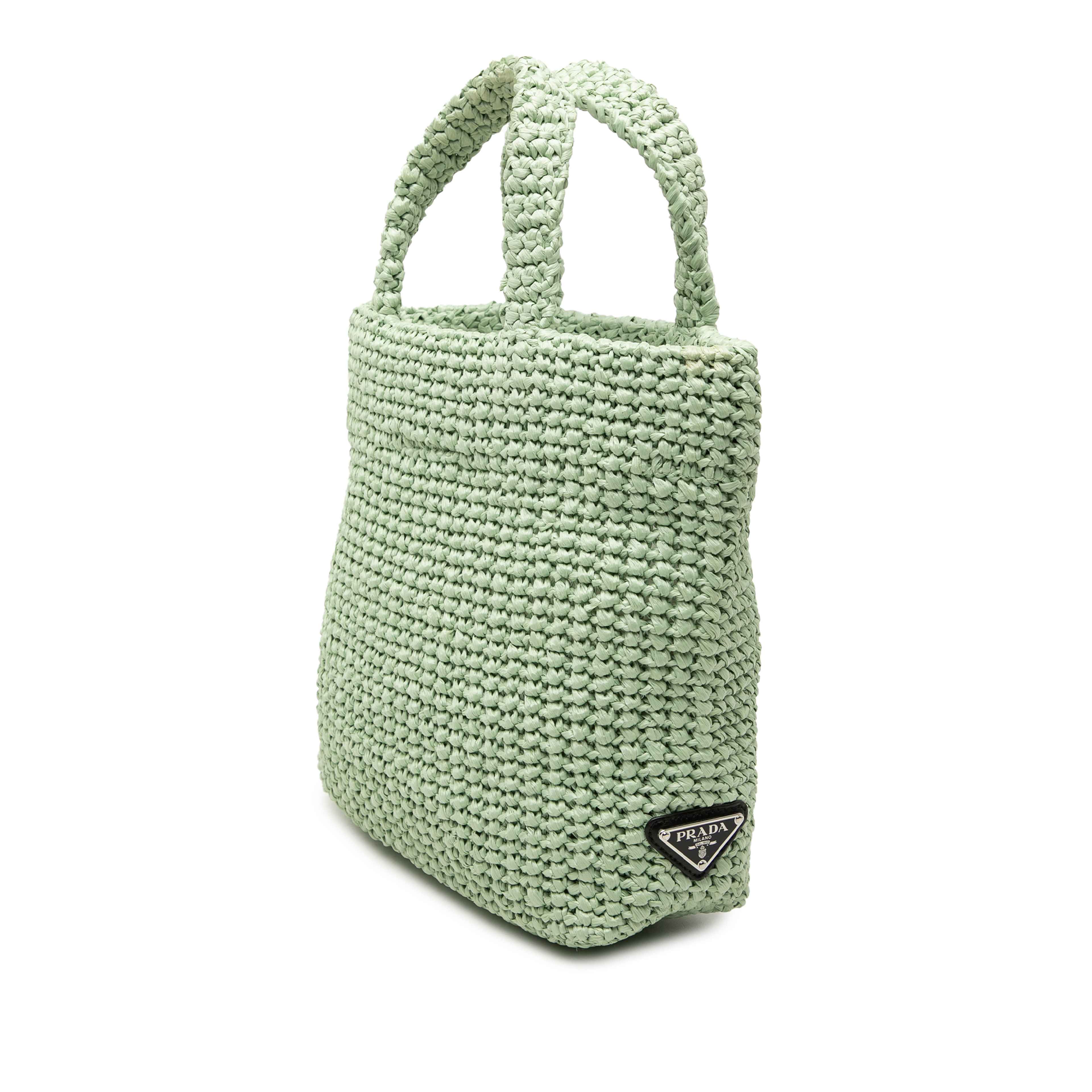 Prada Small Raffia Effect Crochet Embroidered Logo Tote, från Luxclusif, i färgen light green. Klicka för att öppna bilden i stort format