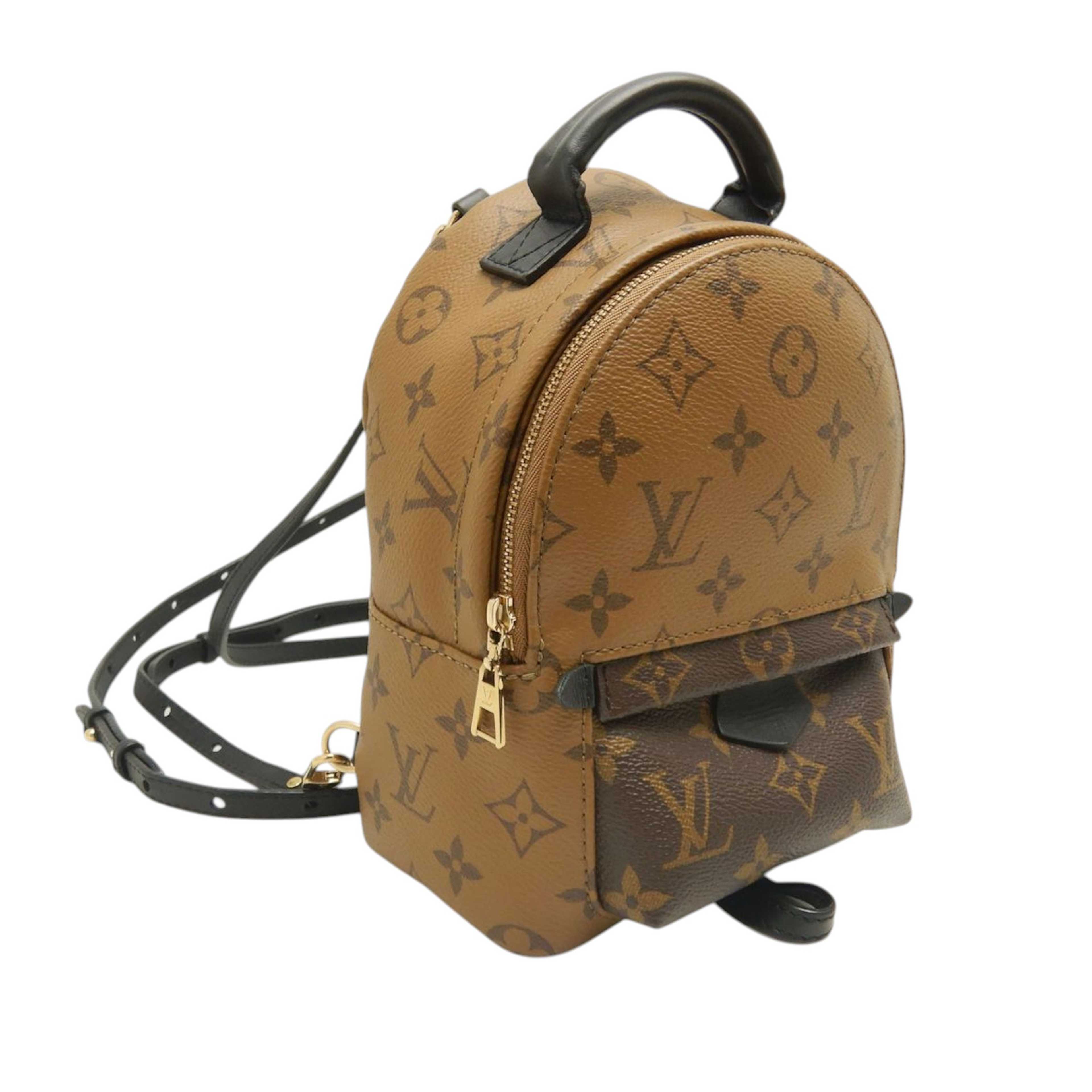 Louis Vuitton Monogram Reverse Mini Palm Springs, från Luxclusif, i färgen brun. Klicka för att öppna bilden i stort format