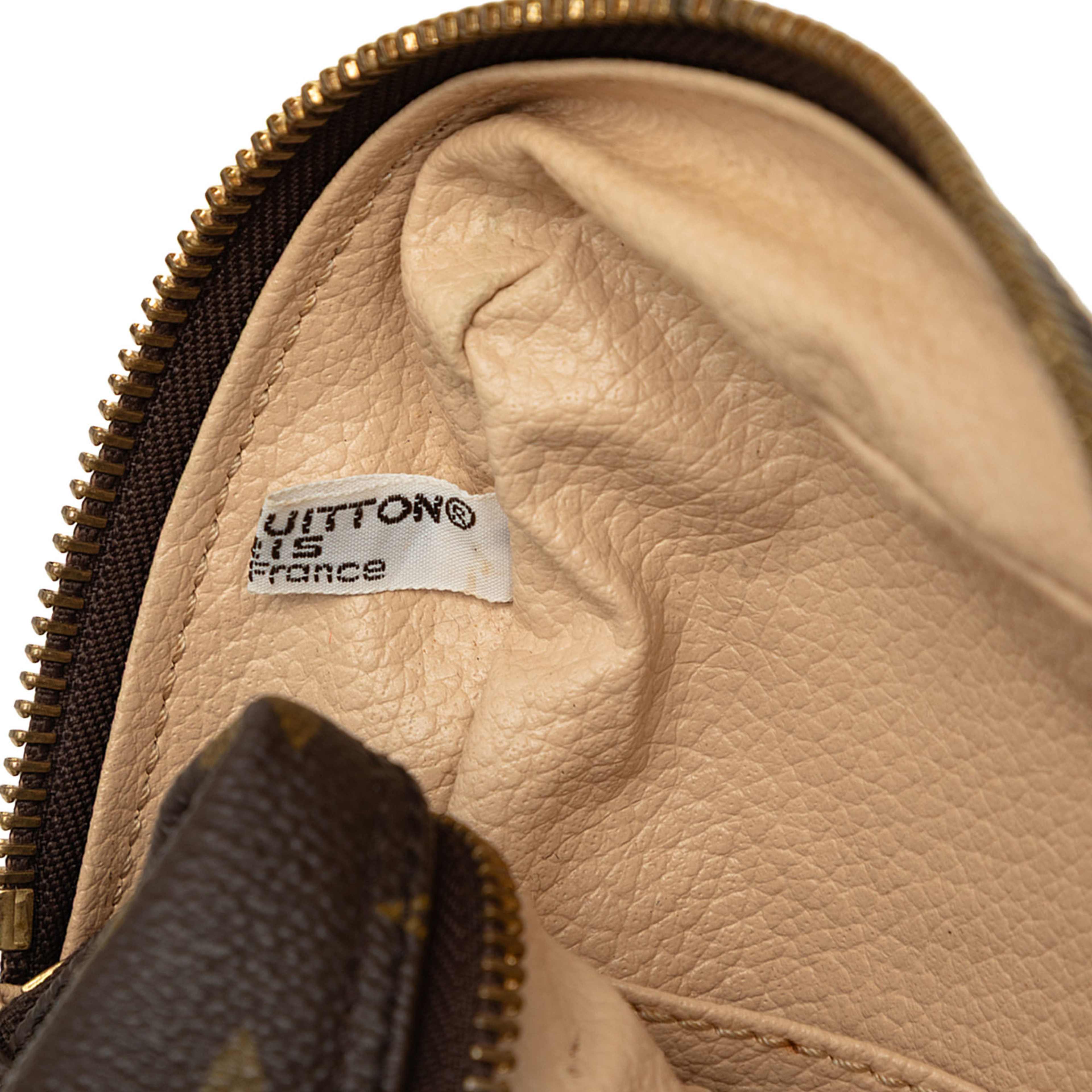 Louis Vuitton Monogram Trousse Toilette 28, från Luxclusif, i färgen brun. Klicka för att öppna bilden i stort format