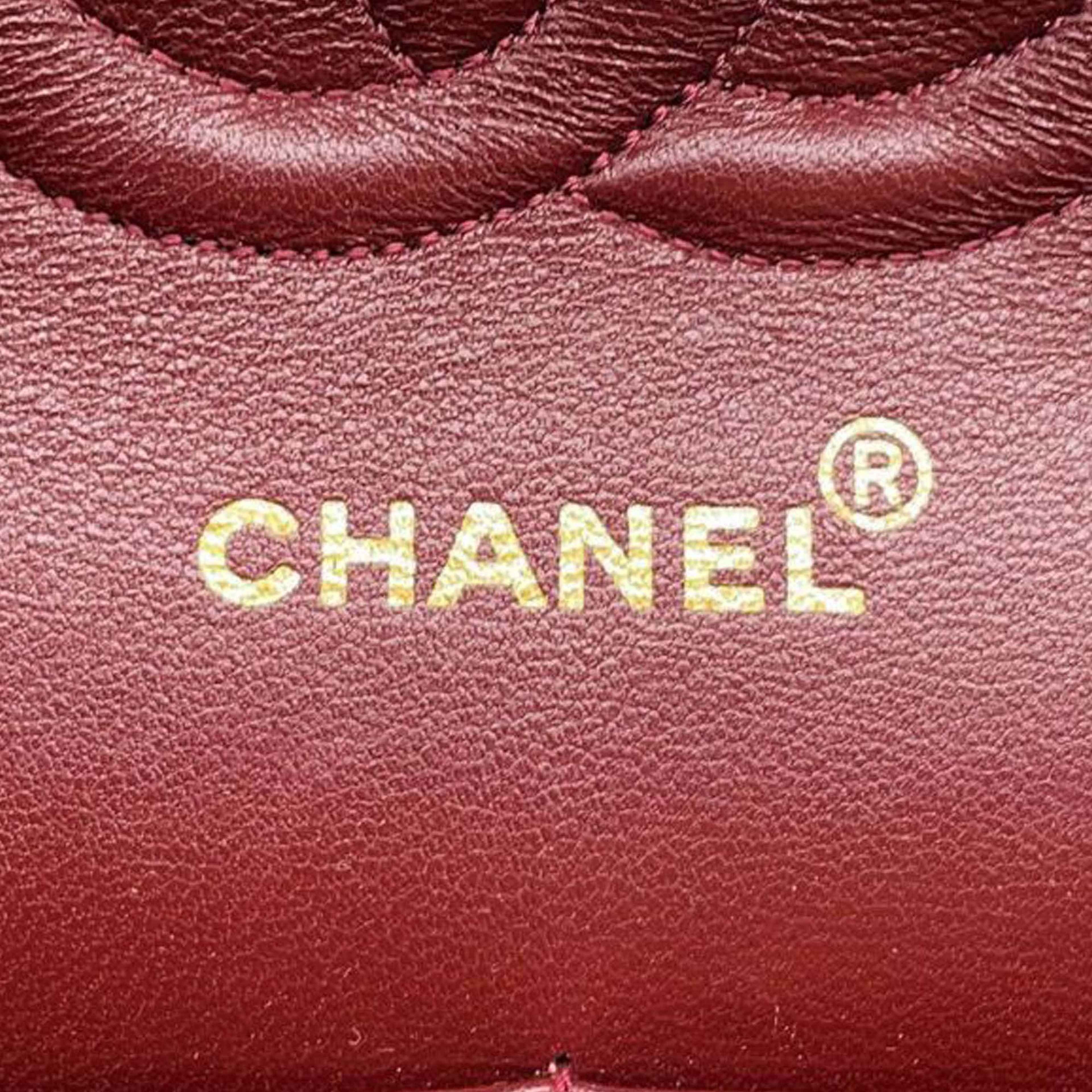 Chanel Medium Classic Jersey Double Flap, från Luxclusif, i färgen navy. Klicka för att öppna bilden i stort format