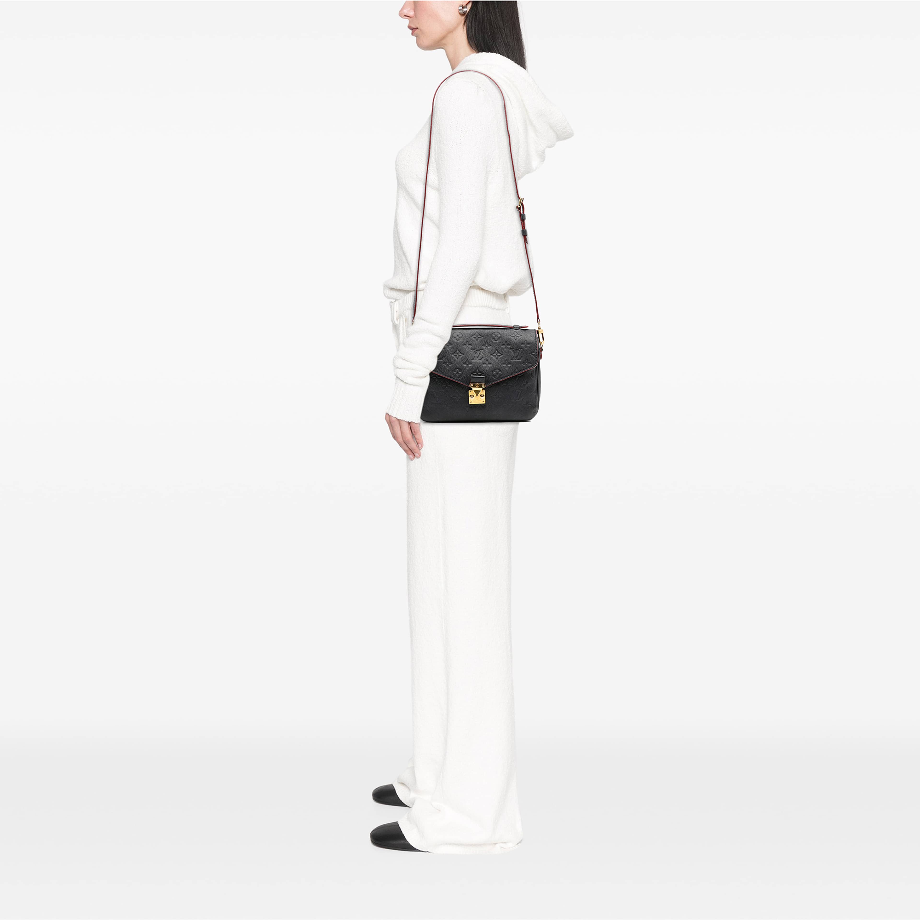 Louis Vuitton Monogram Empreinte Pochette Metis, från Luxclusif, i färgen blå. Klicka för att öppna bilden i stort format
