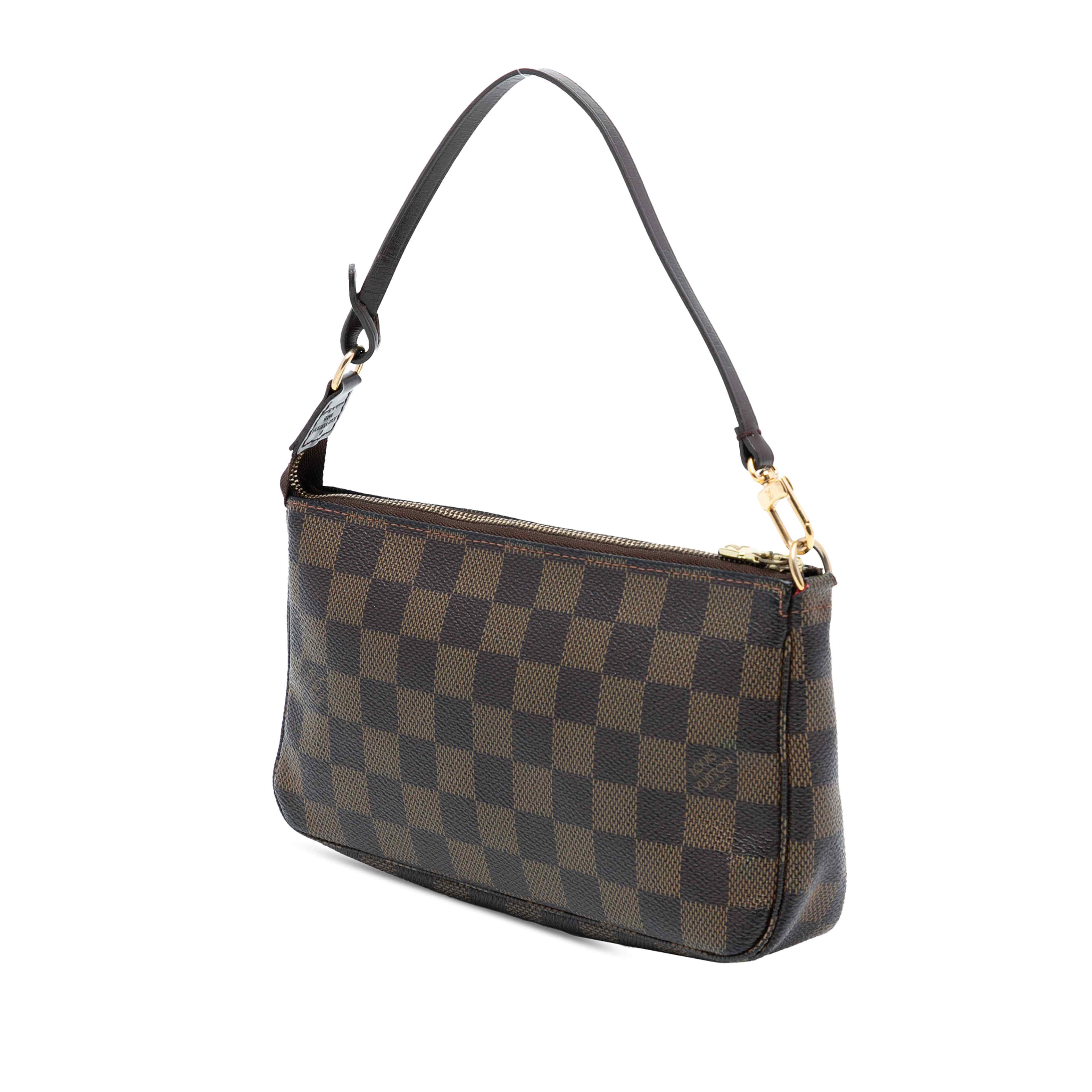 Louis Vuitton Damier Ebene Pochette Accessoires, från Luxclusif, i färgen brown. Klicka för att öppna bilden i stort format