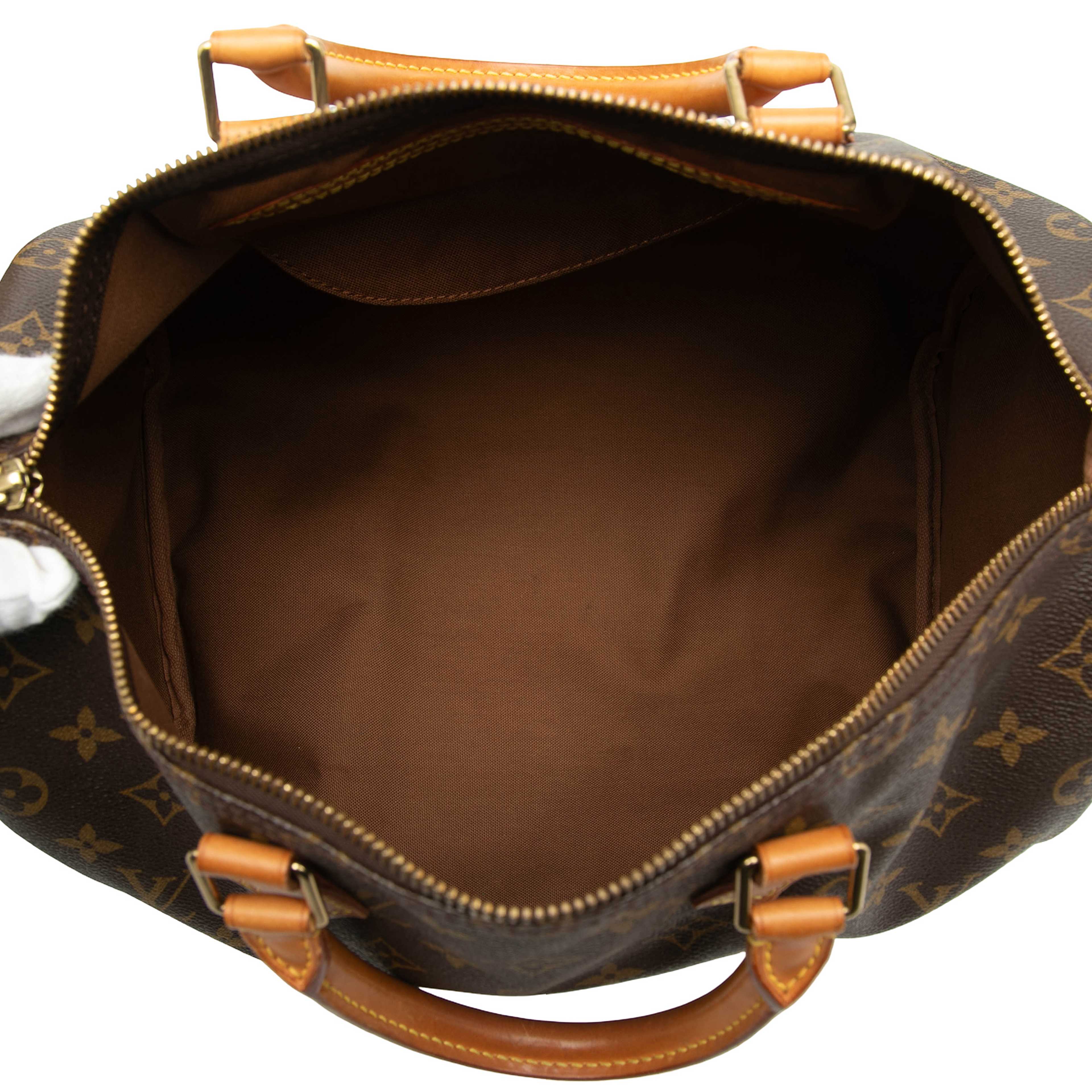 Louis Vuitton Monogram Speedy 35, från Luxclusif, i färgen brown. Klicka för att öppna bilden i stort format