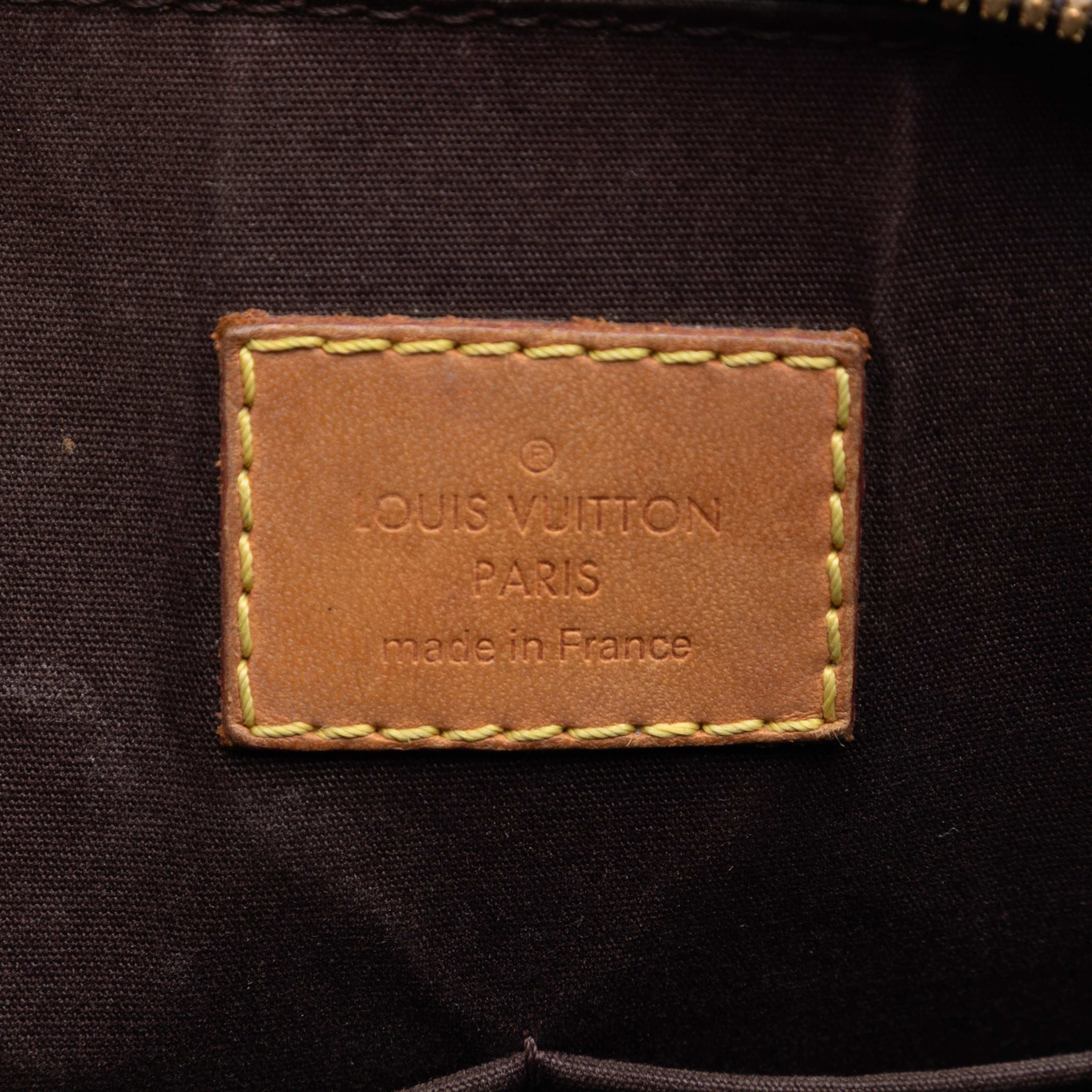 Louis Vuitton Monogram Vernis Alma Pm, från Luxclusif, i färgen plum. Klicka för att öppna bilden i stort format