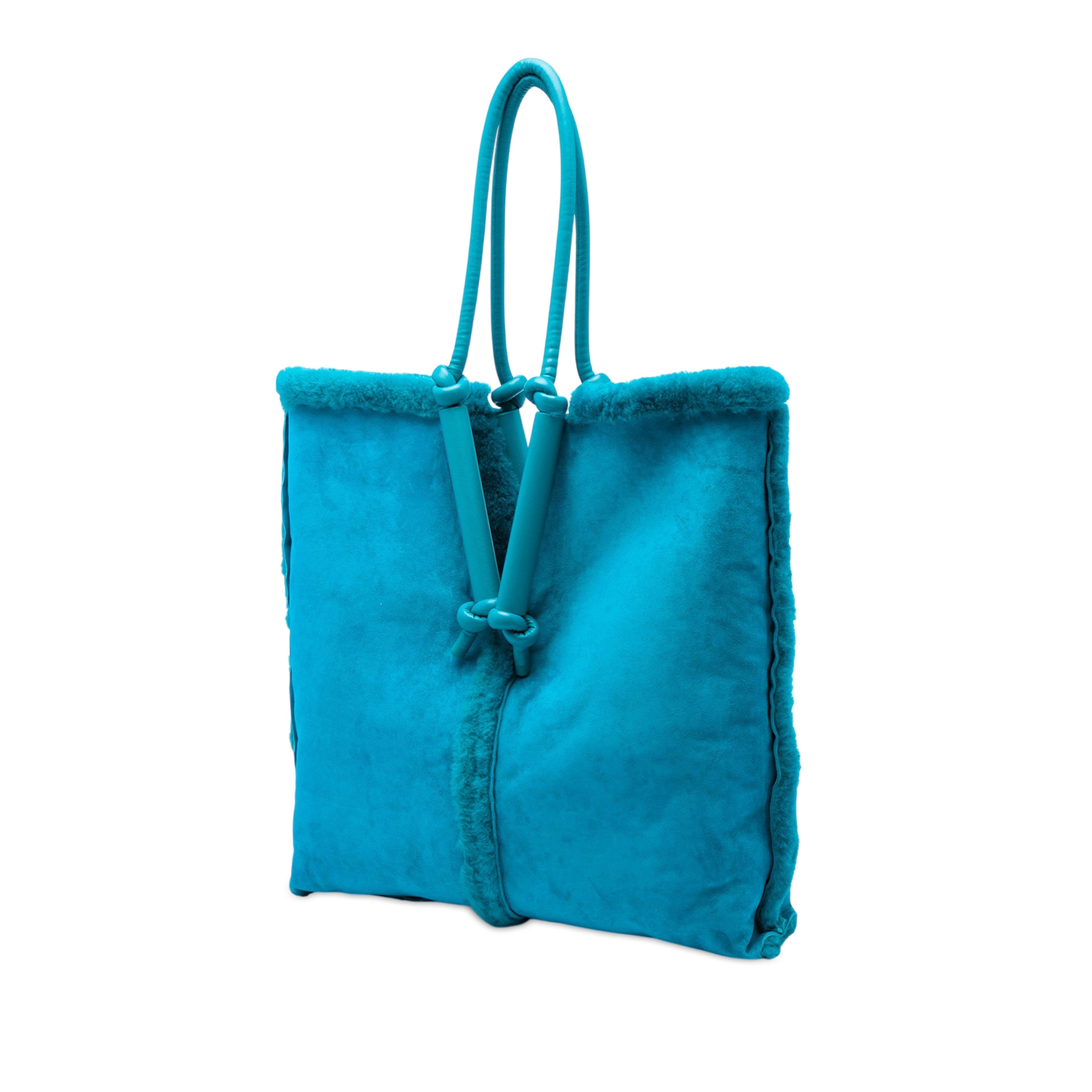 Bottega Veneta Suede And Shearling Bolster Reversible Tote, från Luxclusif, i färgen blå. Klicka för att öppna bilden i stort format