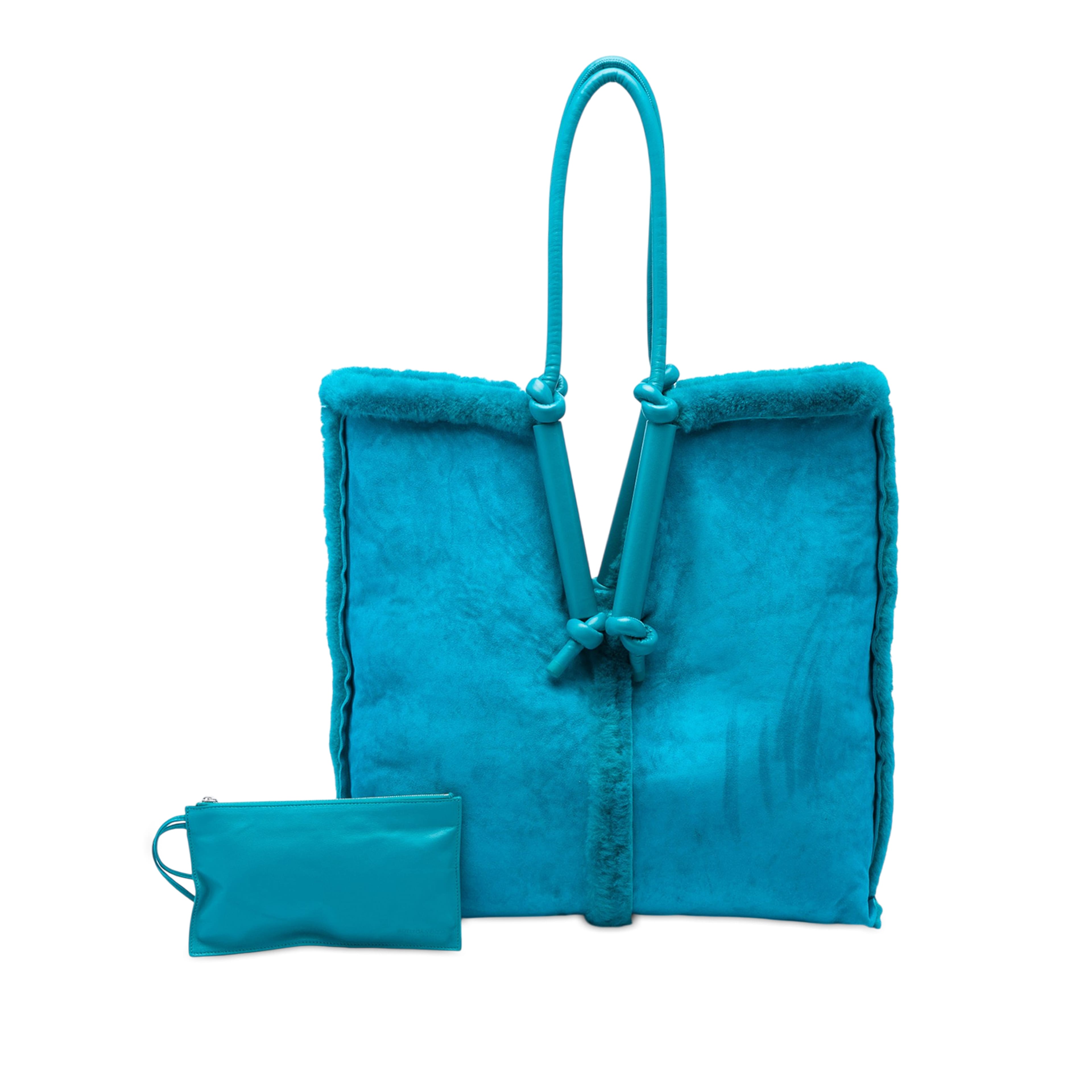 Bottega Veneta Suede And Shearling Bolster Reversible Tote, från Luxclusif, i färgen blå. Klicka för att öppna bilden i stort format