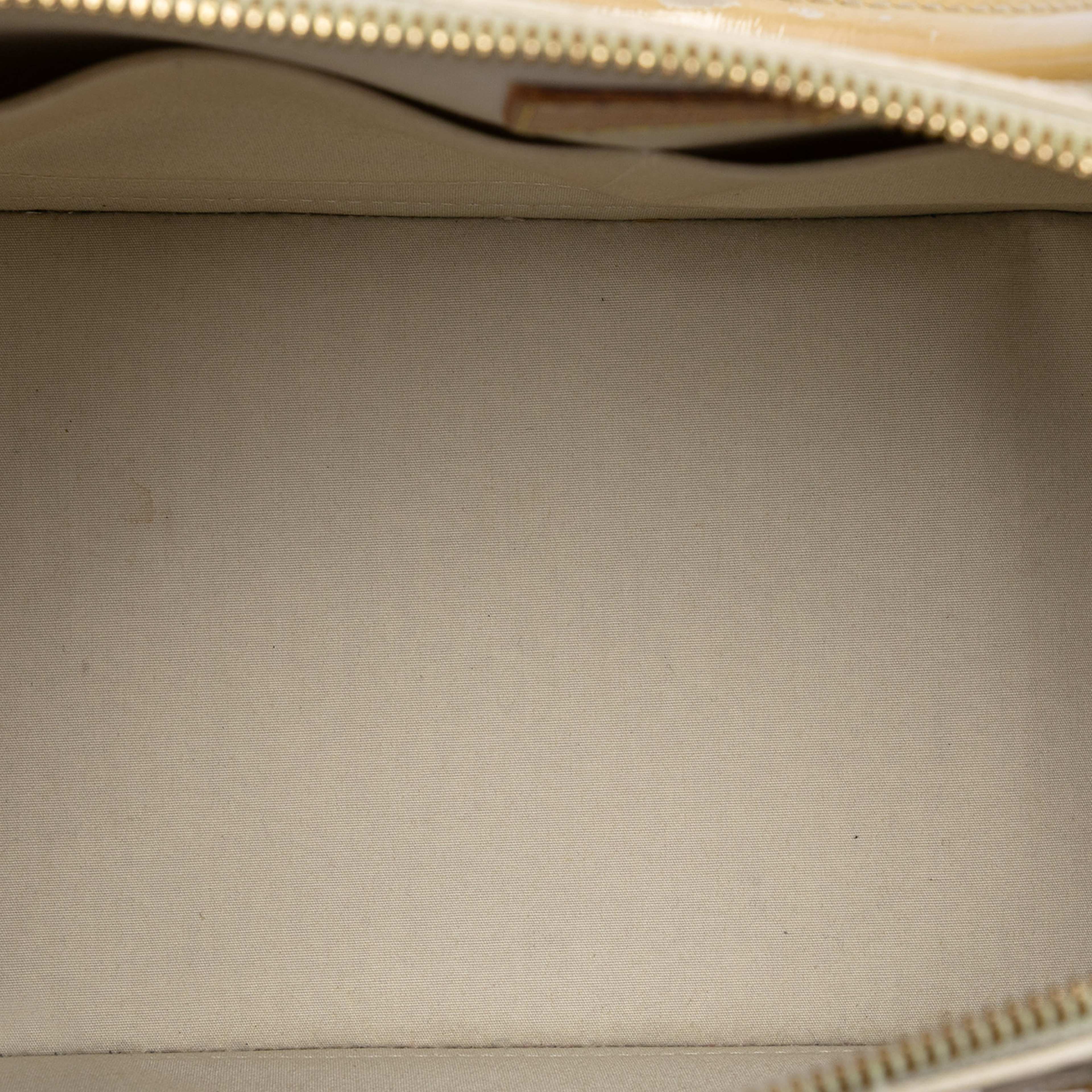 Louis Vuitton Monogram Vernis Alma Pm, från Luxclusif, i färgen beige. Klicka för att öppna bilden i stort format