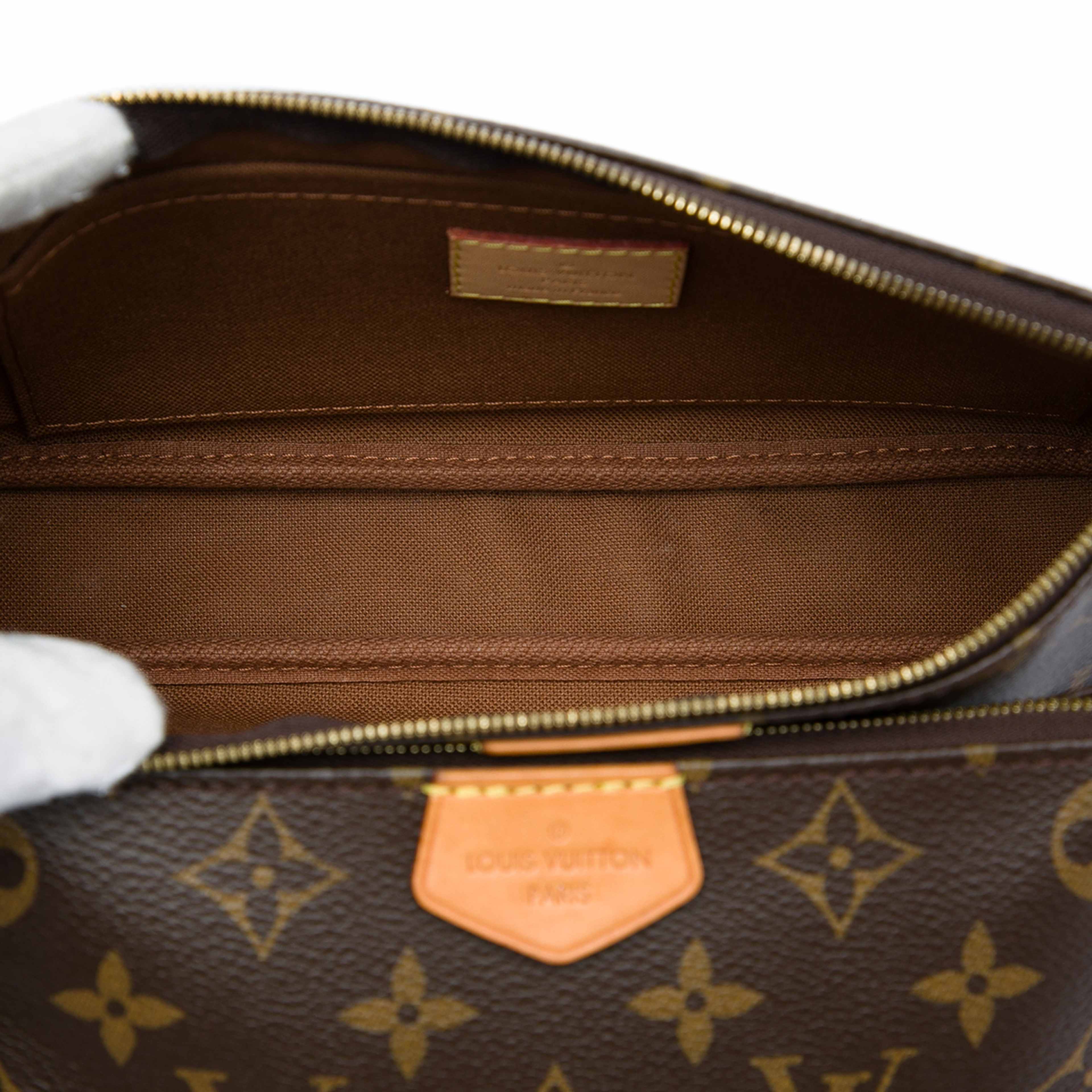 Louis Vuitton Monogram Multi Pochette Accessoires, från Luxclusif, i färgen brun. Klicka för att öppna bilden i stort format