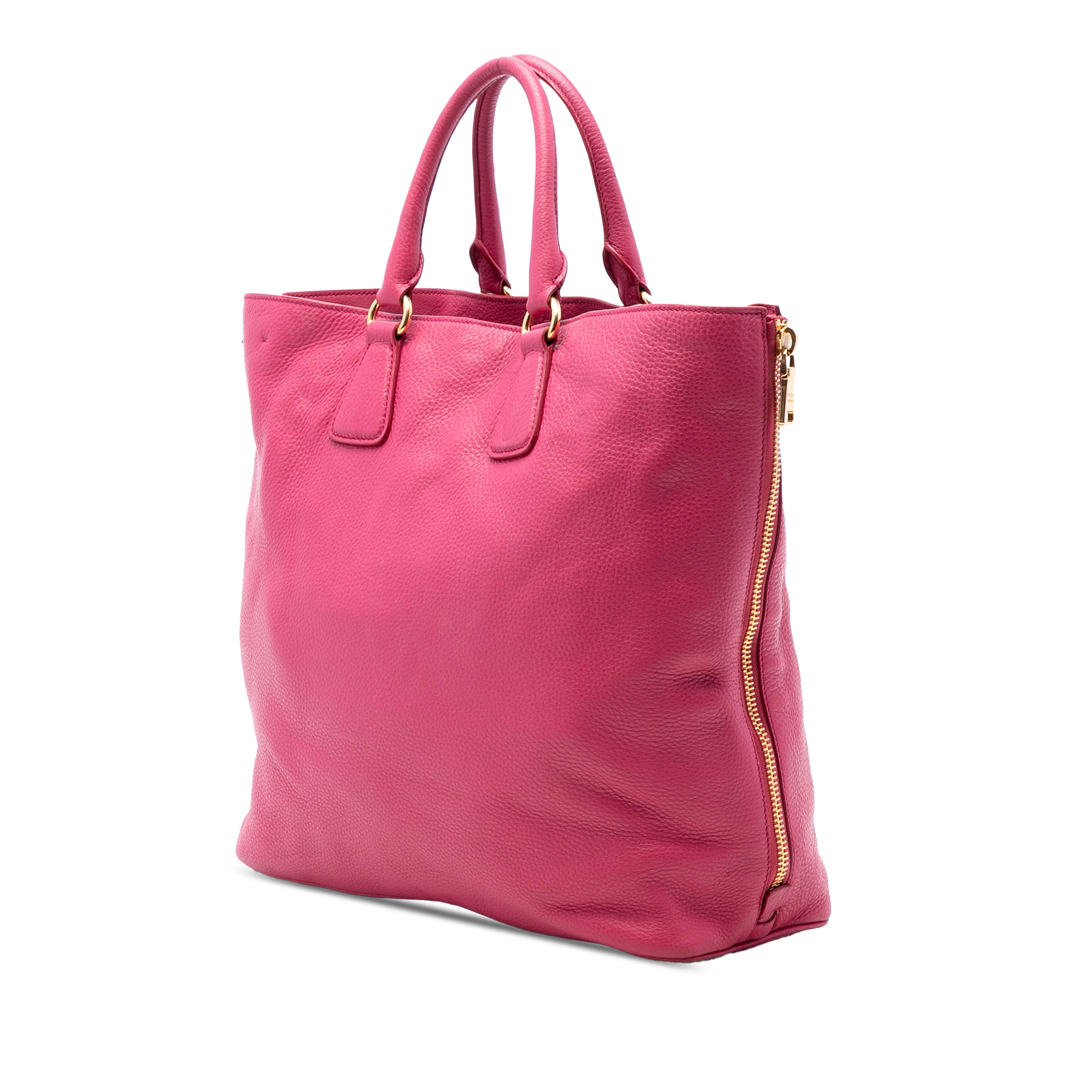 Prada Vitello Daino Side Zip Open Convertible Tote, från Luxclusif, i färgen hot pink. Klicka för att öppna bilden i stort format