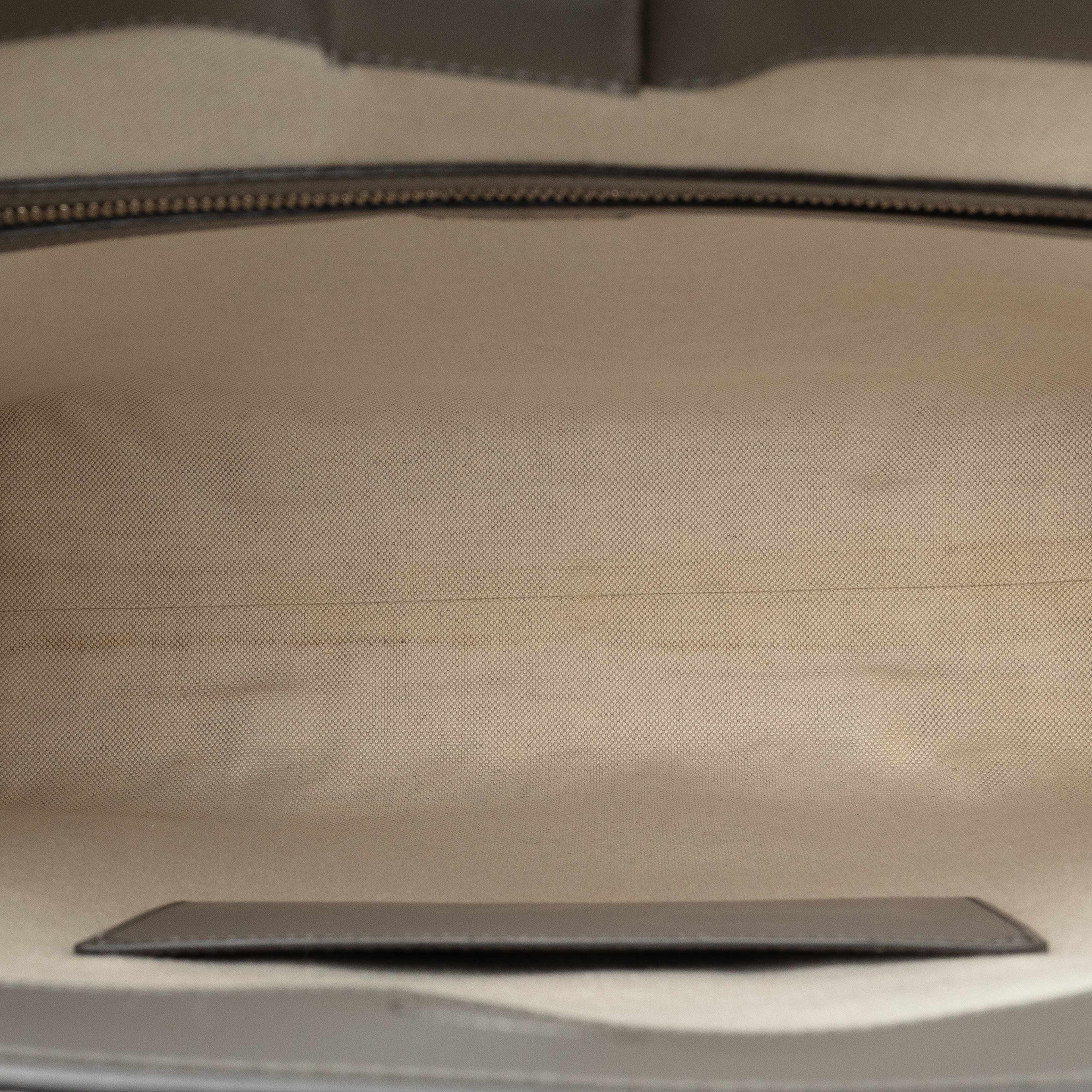 Gucci Gg Embossed Leather Vertical Tote
