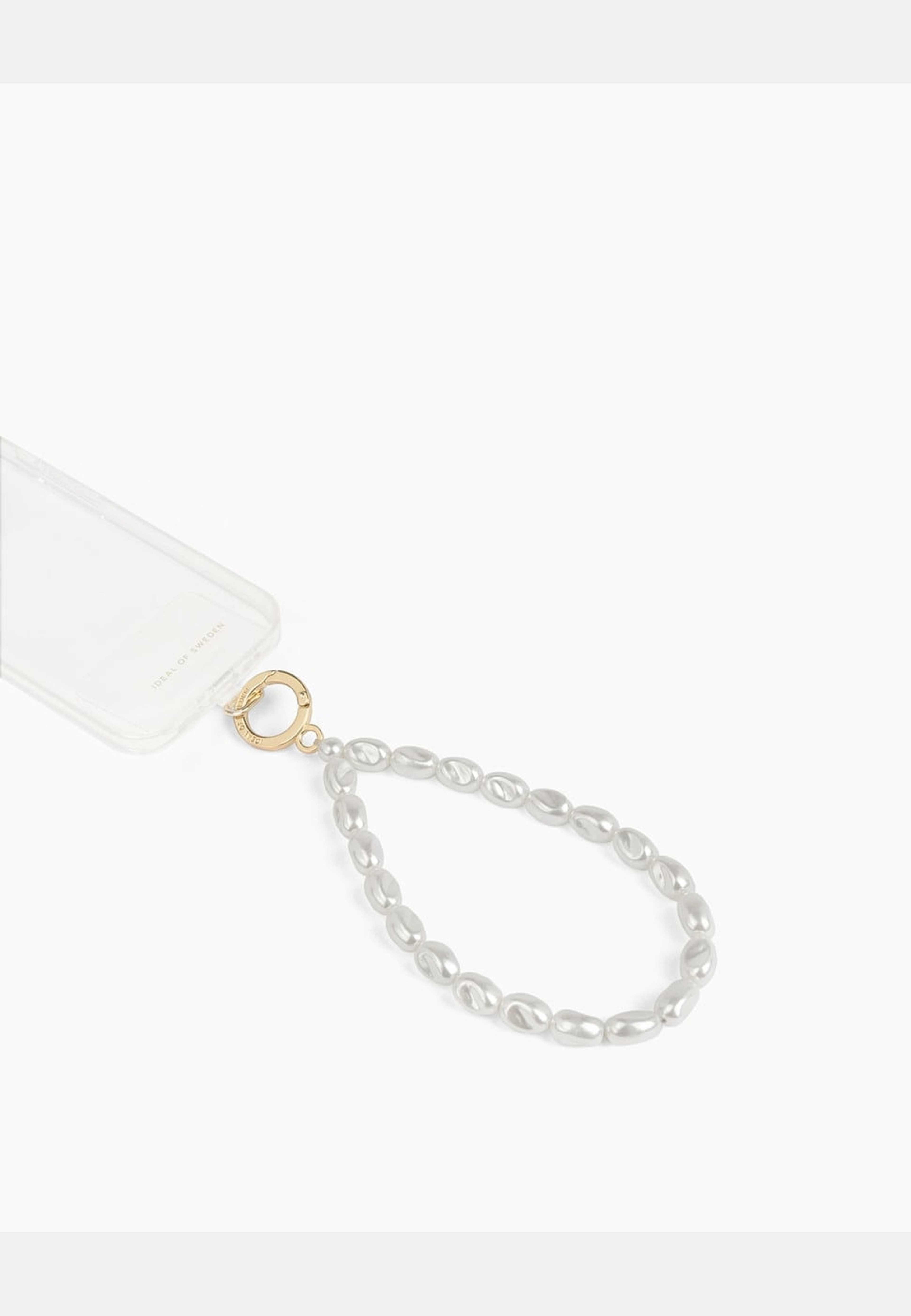 Beaded Wristlet Strap Pearl, från Ideal Of Sweden, i färgen white. Klicka för att öppna bilden i stort format