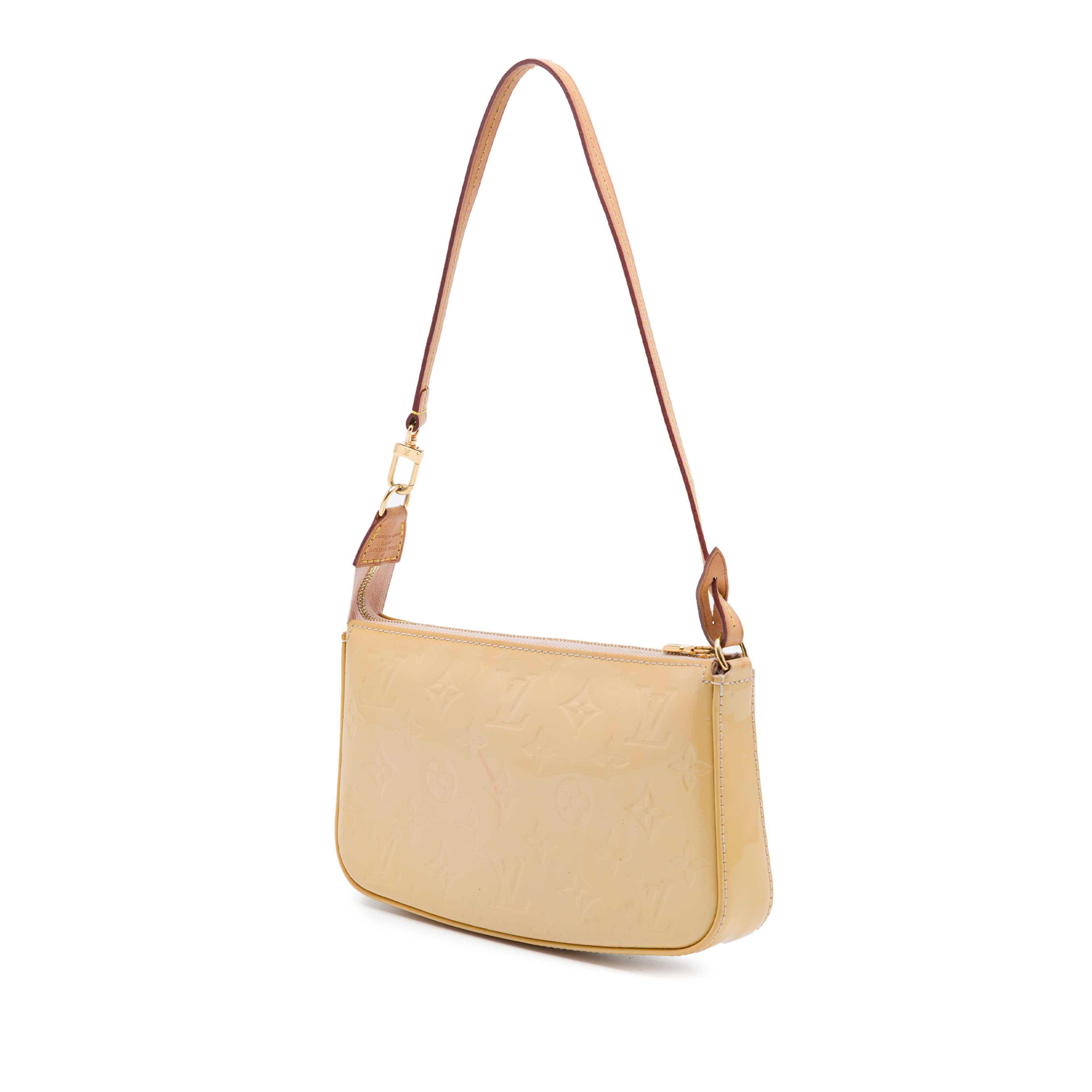 Louis Vuitton Monogram Vernis Pochette Accessoires, från Luxclusif, i färgen beige. Klicka för att öppna bilden i stort format