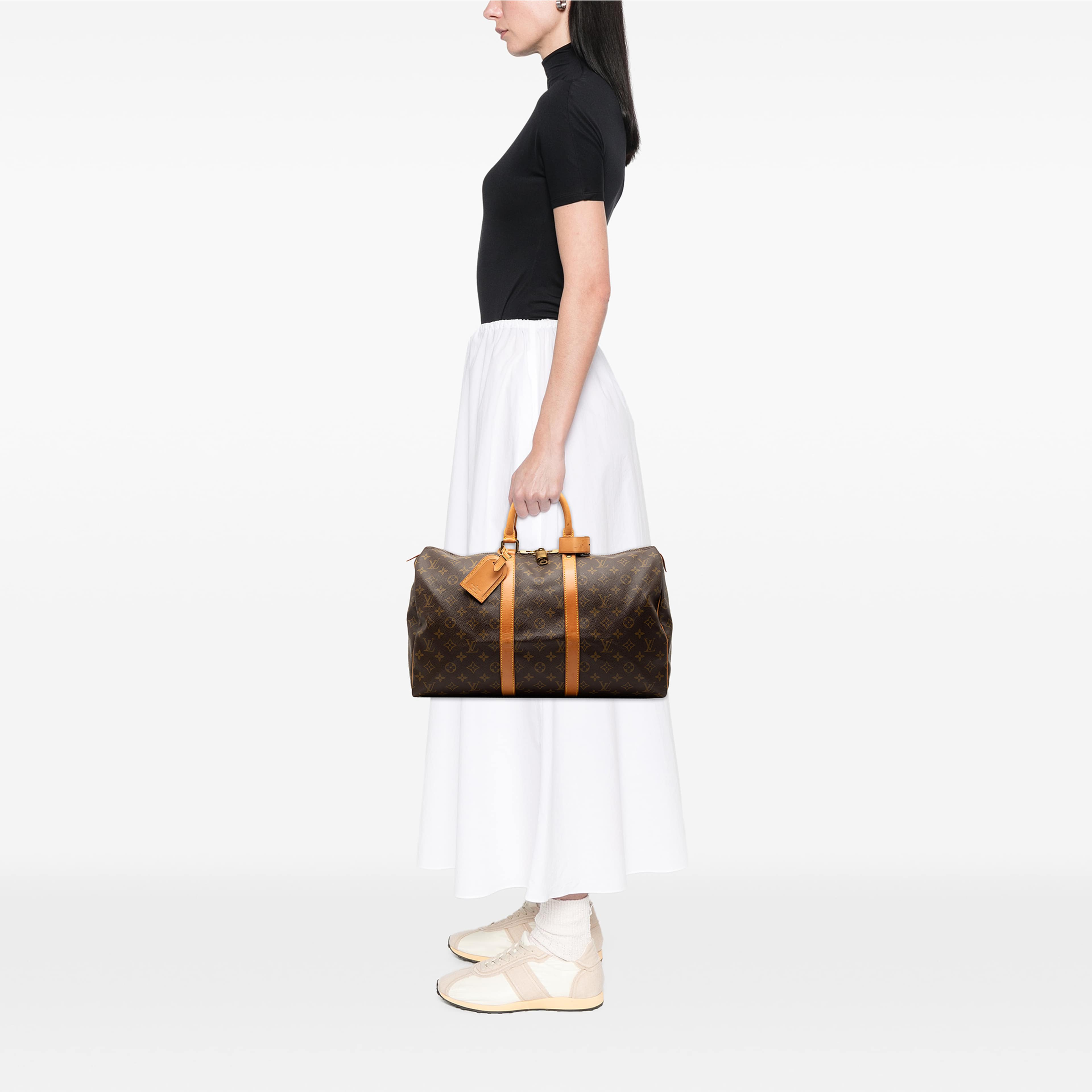 Louis Vuitton Monogram Keepall 45, från Luxclusif, i färgen brun. Klicka för att öppna bilden i stort format